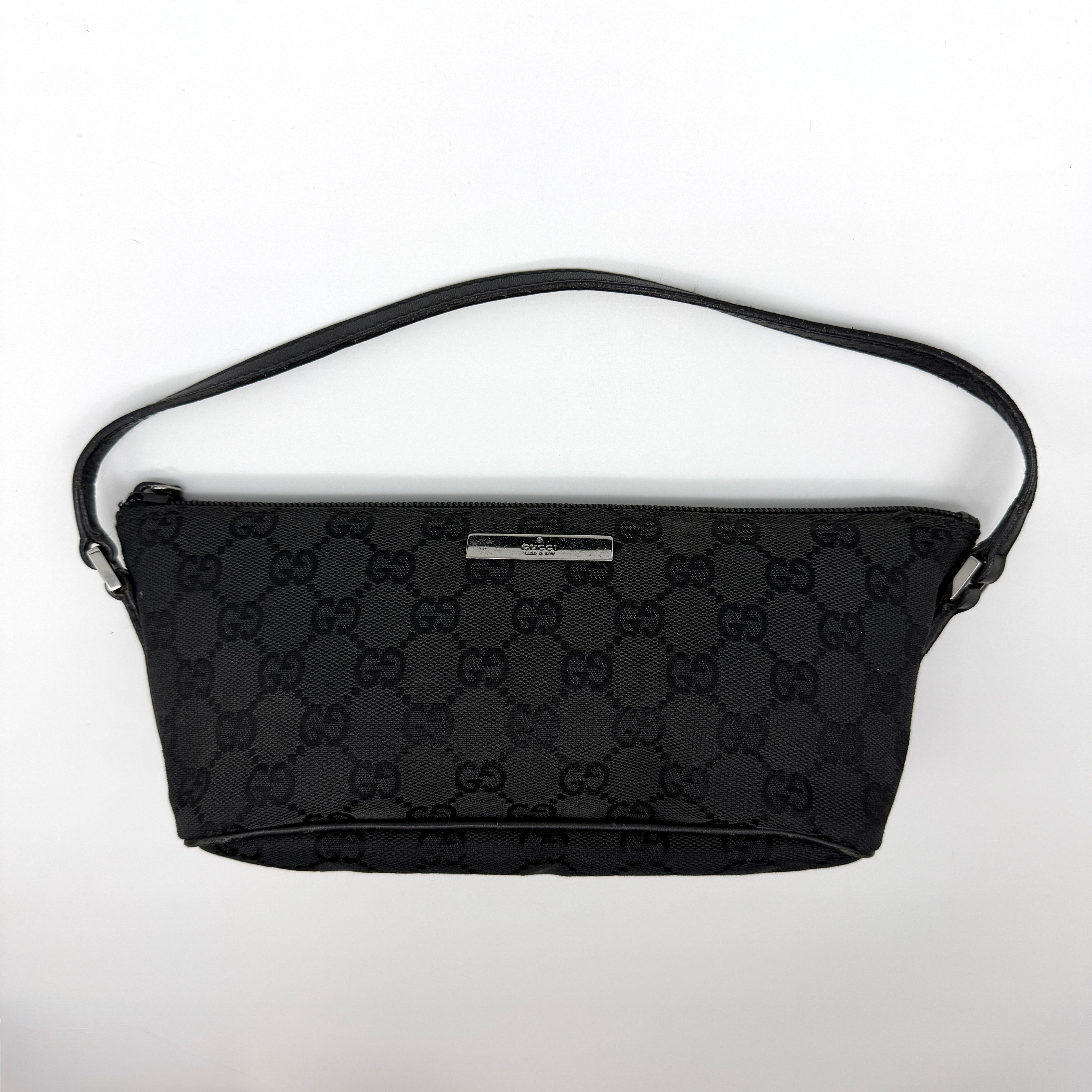 Gucci GG Monogram Pochette Boat Shoulder Bag in black jacquard canvas with silver-tone hardware and leather strap.
