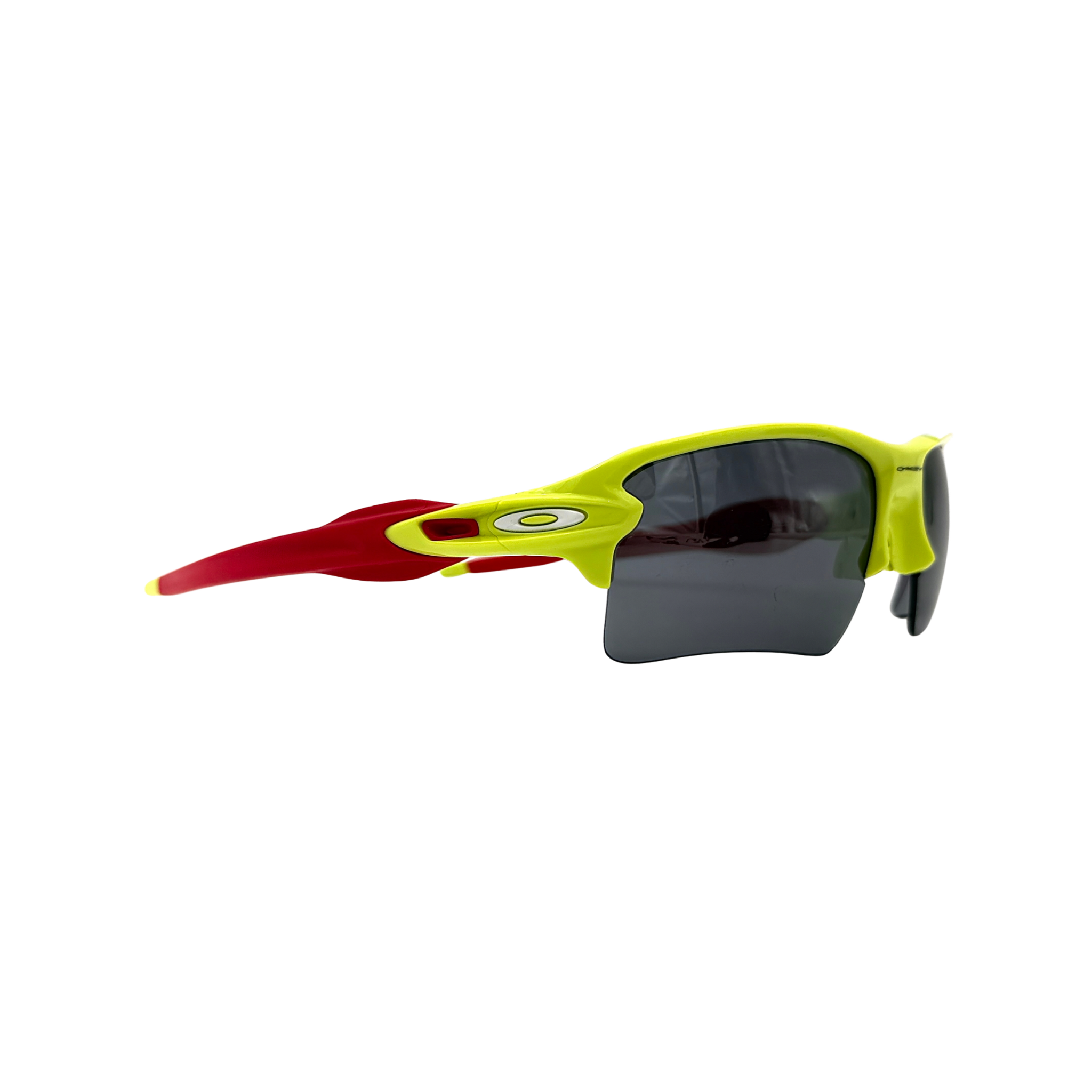Oakley Flak 2.0 Prizm sunglasses in neon yellow and red from the Staple Graffiti Collection with dark grey lens, shown with original Oakley case and accessories.