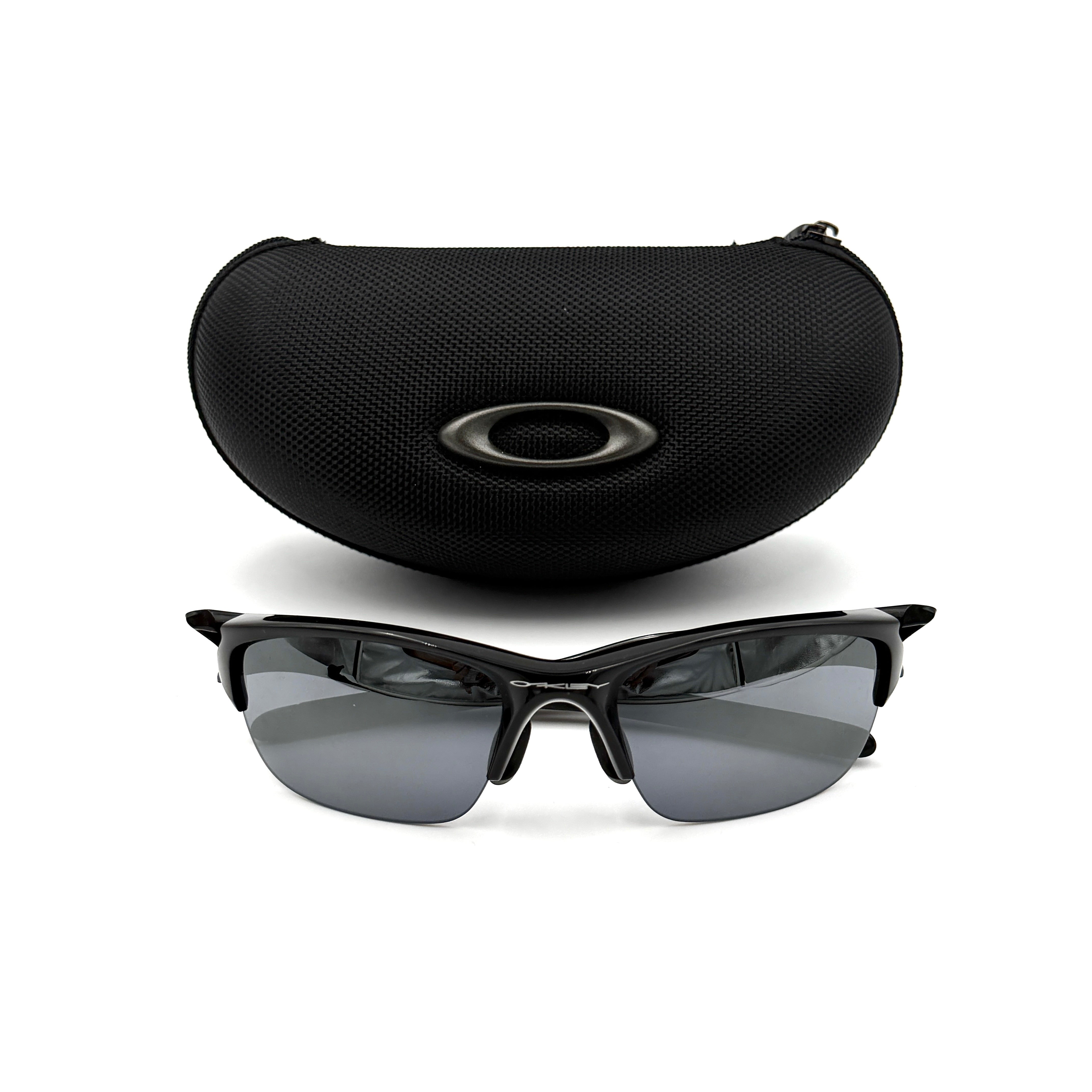 Oakley Half Jacket 2.0 sunglasses in black with semi-rimless wraparound frame and dark tinted lenses displayed from the front