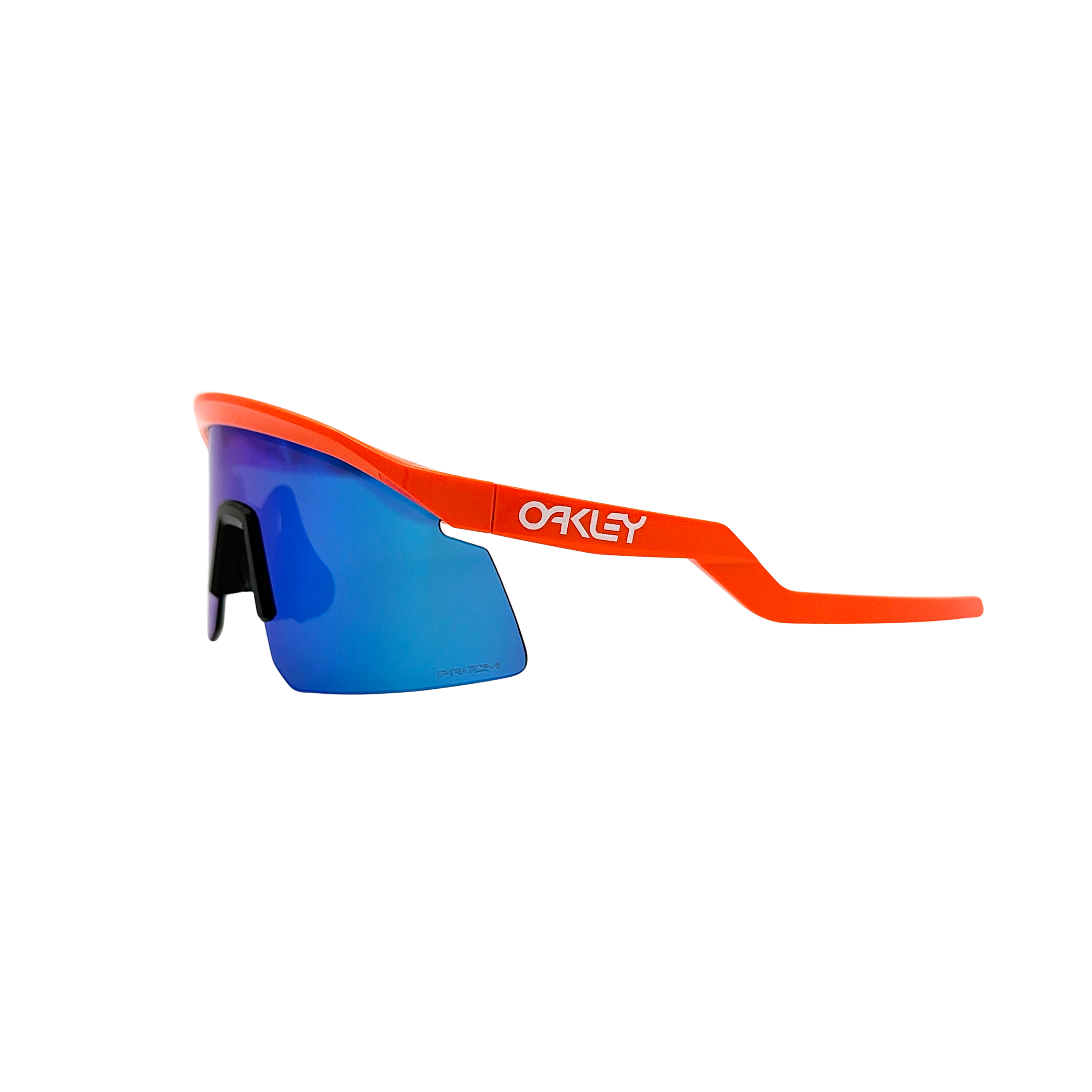 Oakley Hydra Prizm sunglasses in orange with blue mirrored shield lens and Oakley logo at the temple, shown with included hard case.