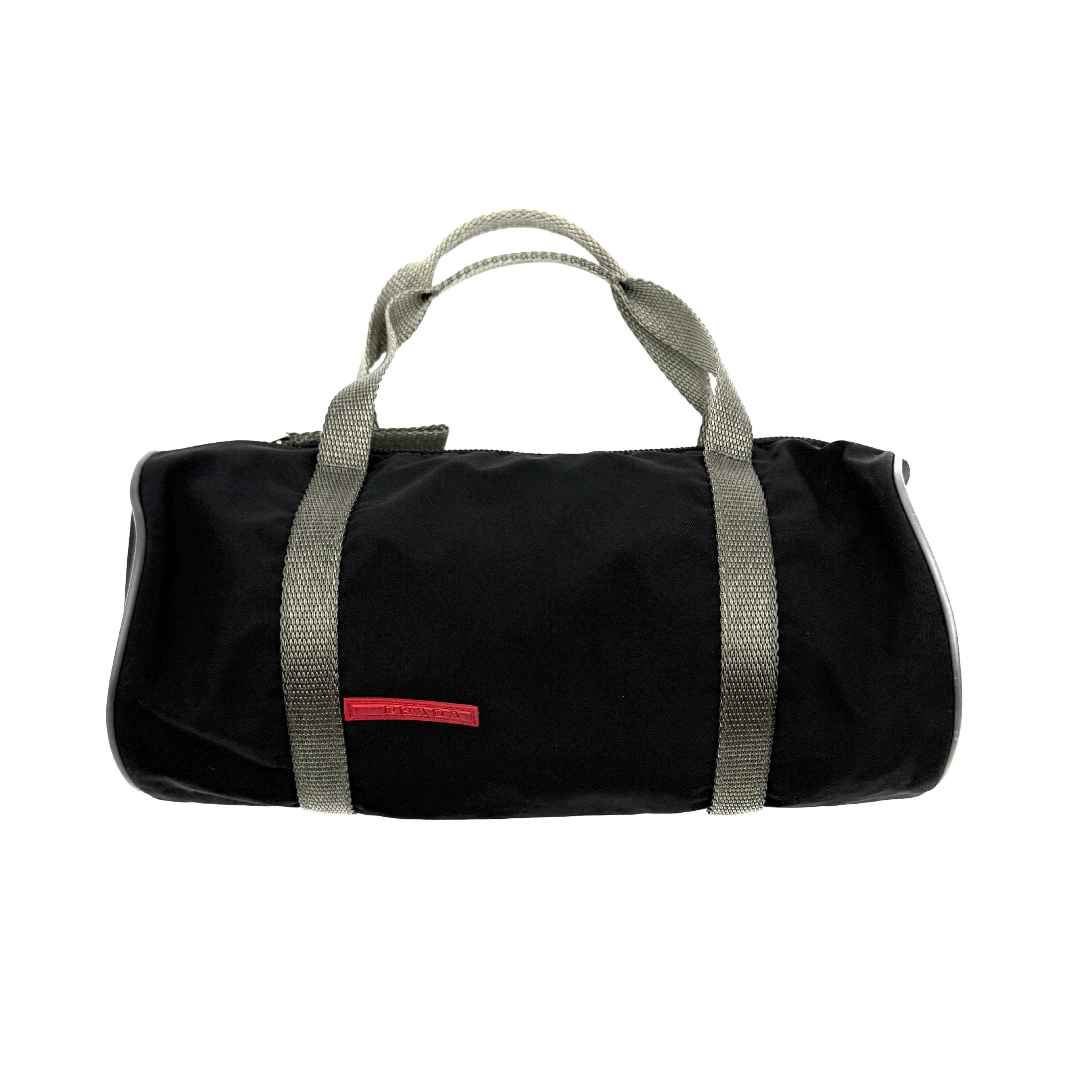 Prada Sport Tessuto Nylon Mini Bag in black with red logo front detail and dual grey handles