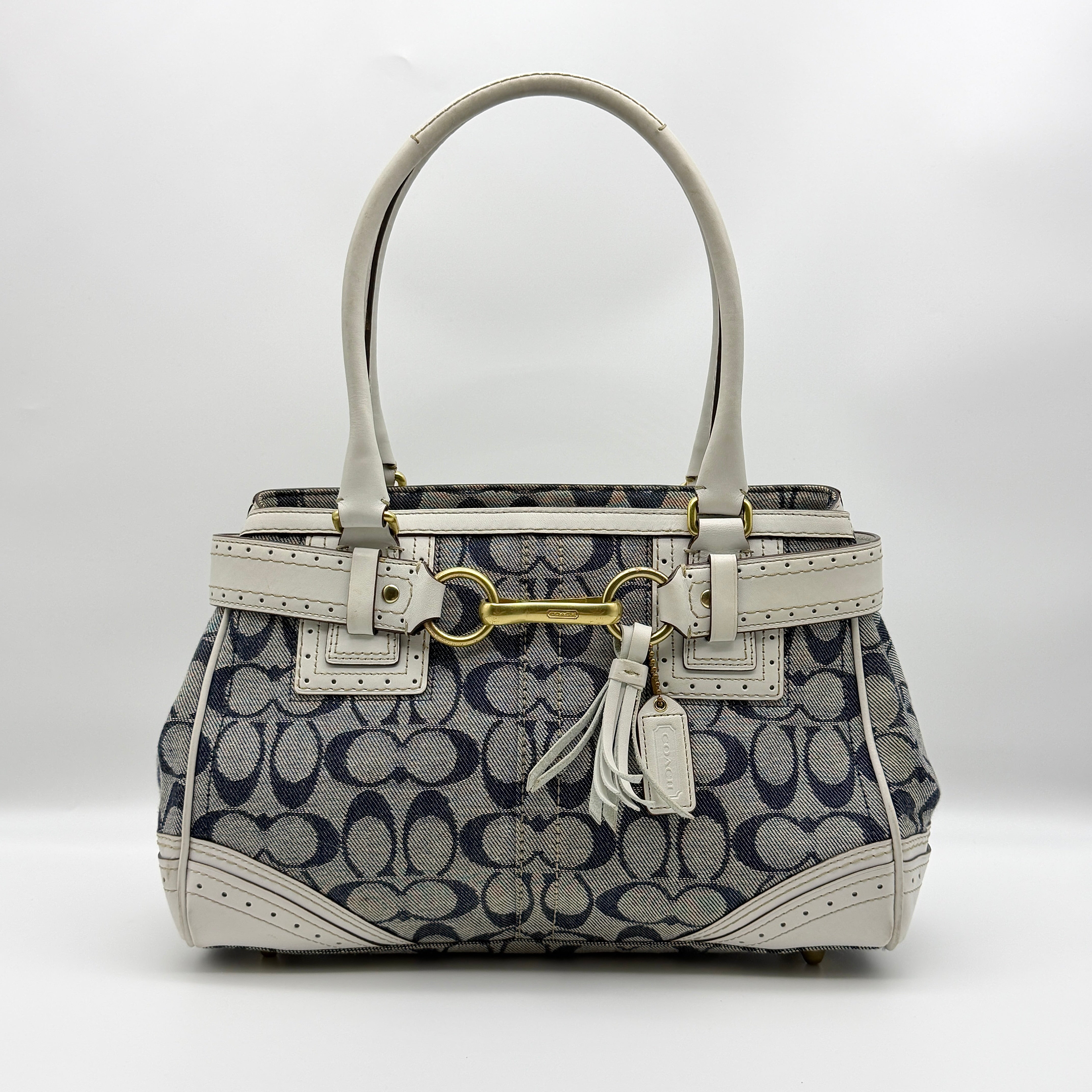 Coach Signature Denim Hampton Carryall Shoulder Bag in blue monogram canvas with ivory leather trim and gold-tone hardware