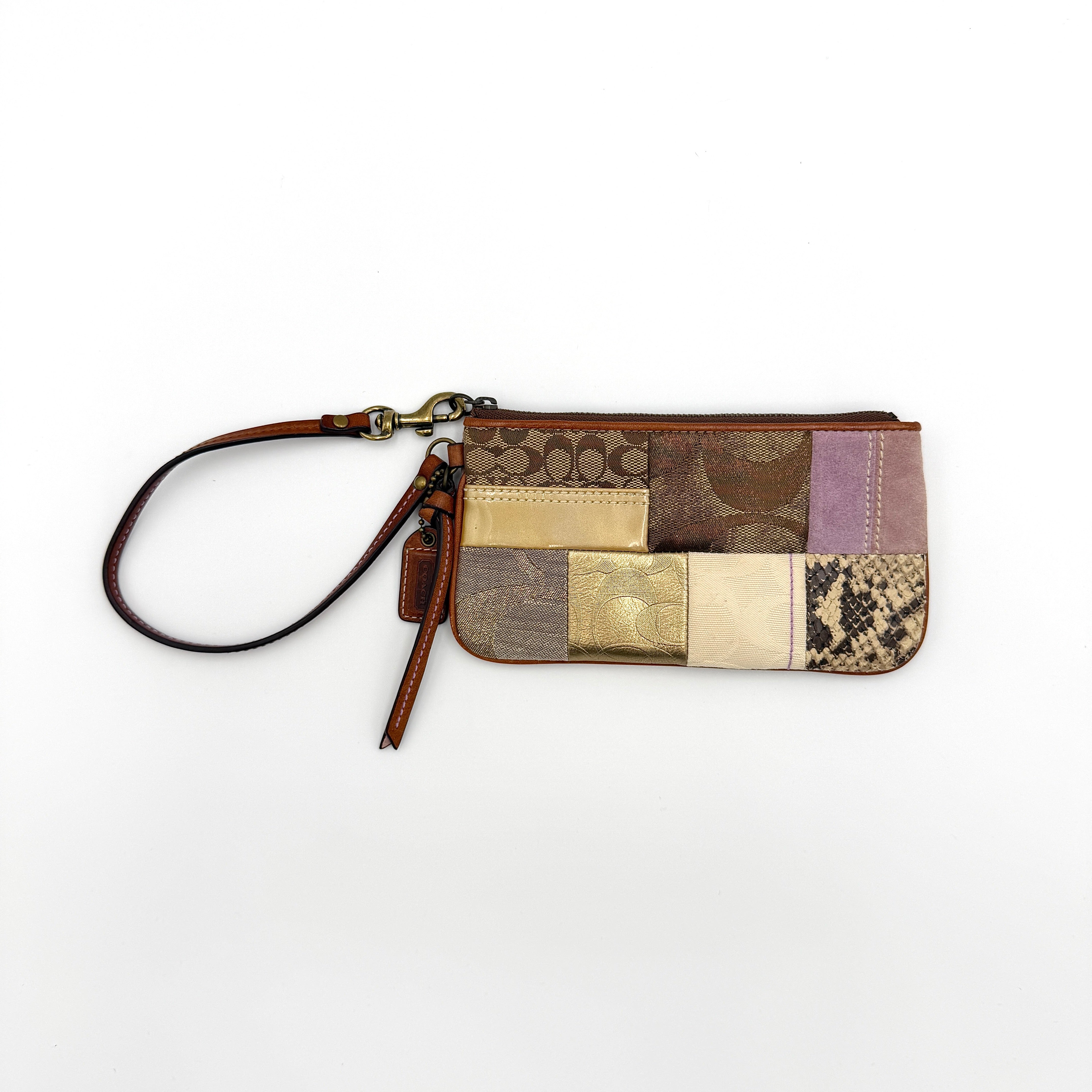 Coach Y2K Patchwork Wristlet in multicolor mix of jacquard, suede, and leather with brass hardware and wrist strap