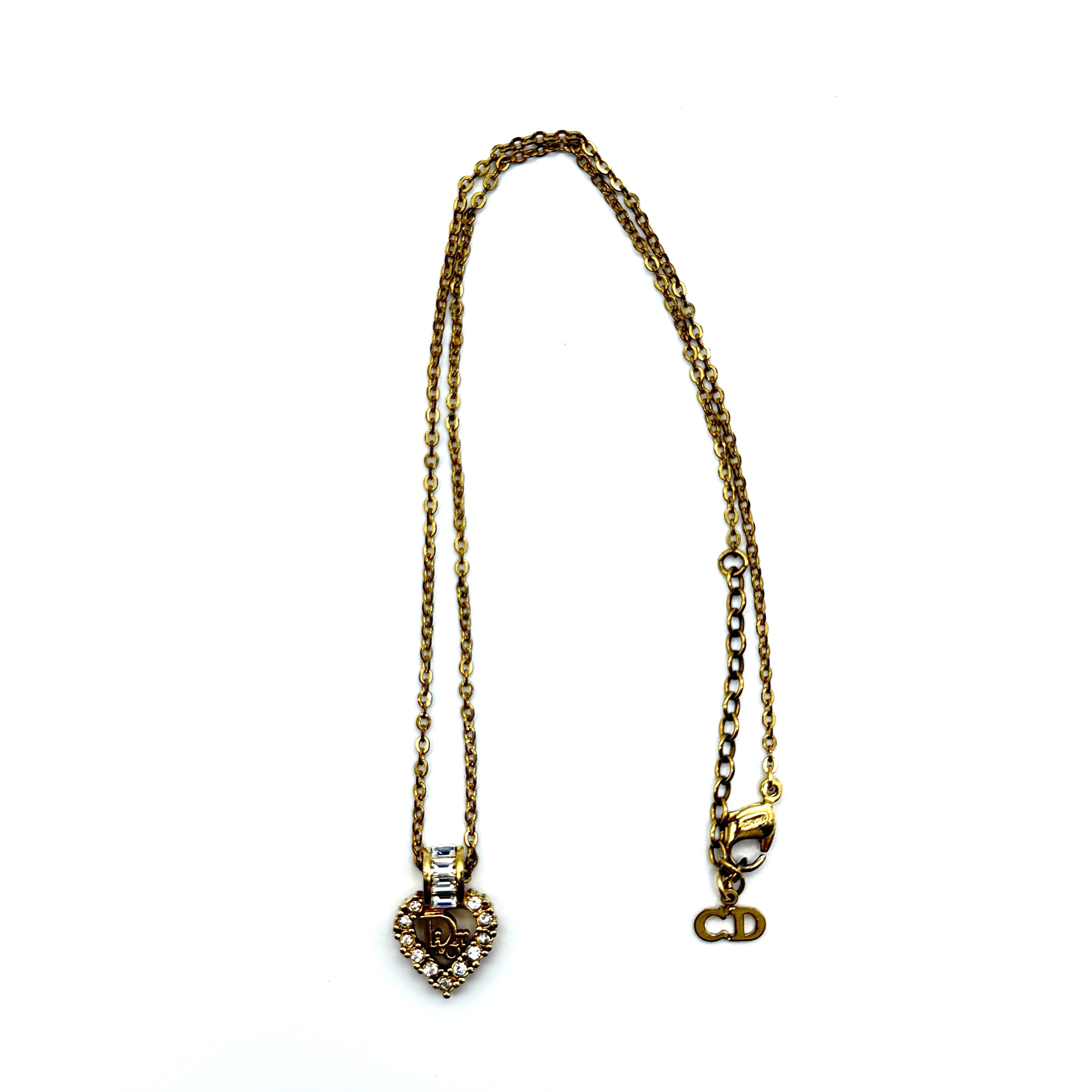 Dior Rhinestone Heart Logo Necklace in gold-tone metal with heart-shaped rhinestone pendant and Dior logo center