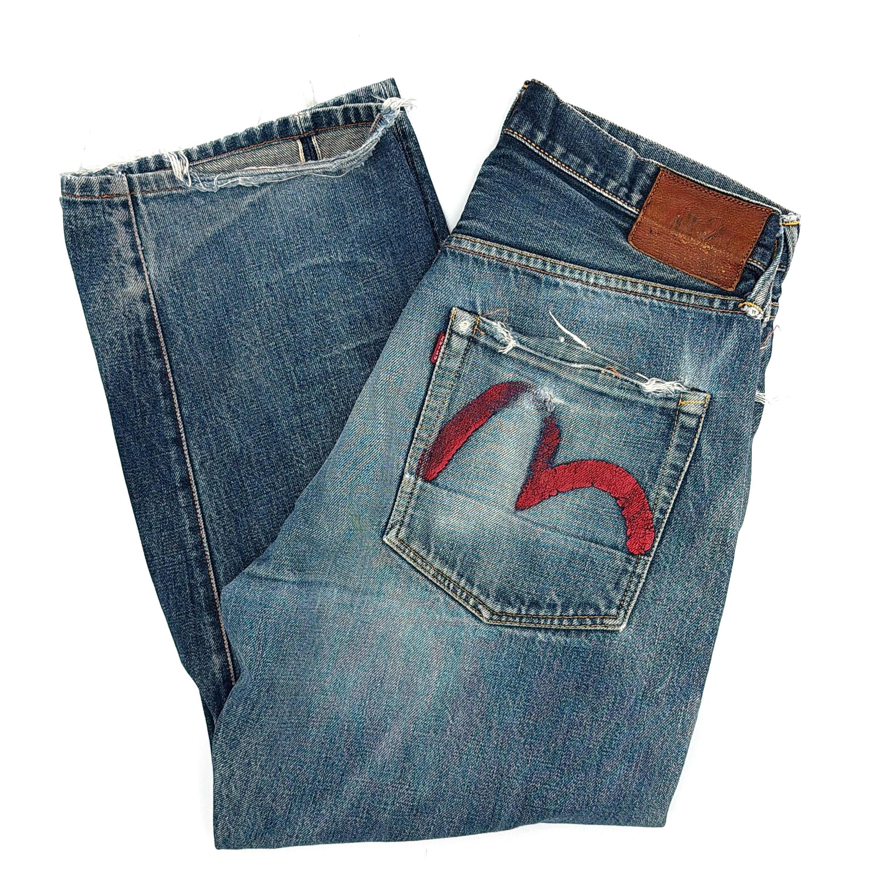 Evisu Double Gull Japanese Selvedge Denim Jeans in blue with red and white hand-painted gull motifs and vintage fade detailing
