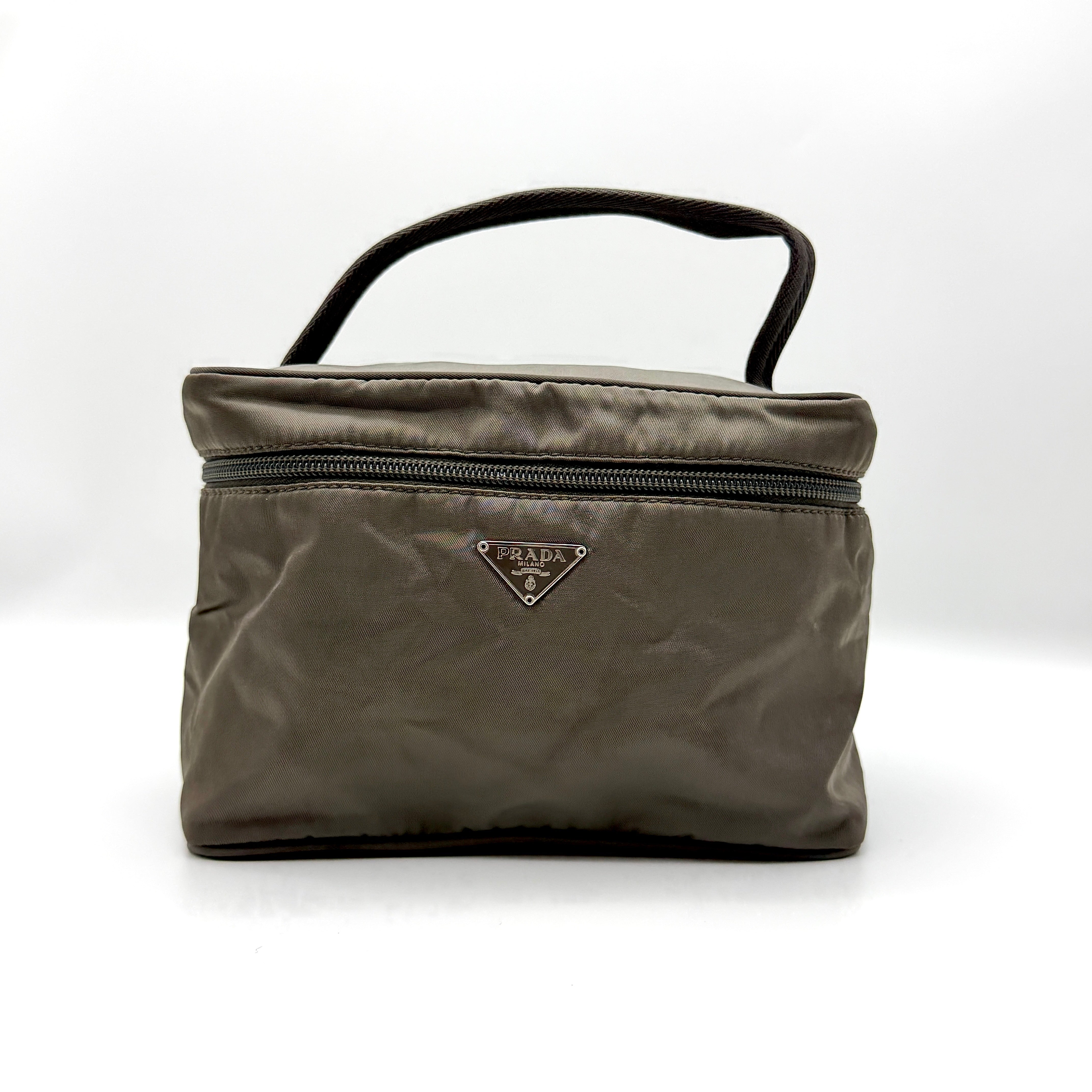 Prada Nylon Vanity Bag in grey with silver-tone hardware, top handle, and triangle enamel logo