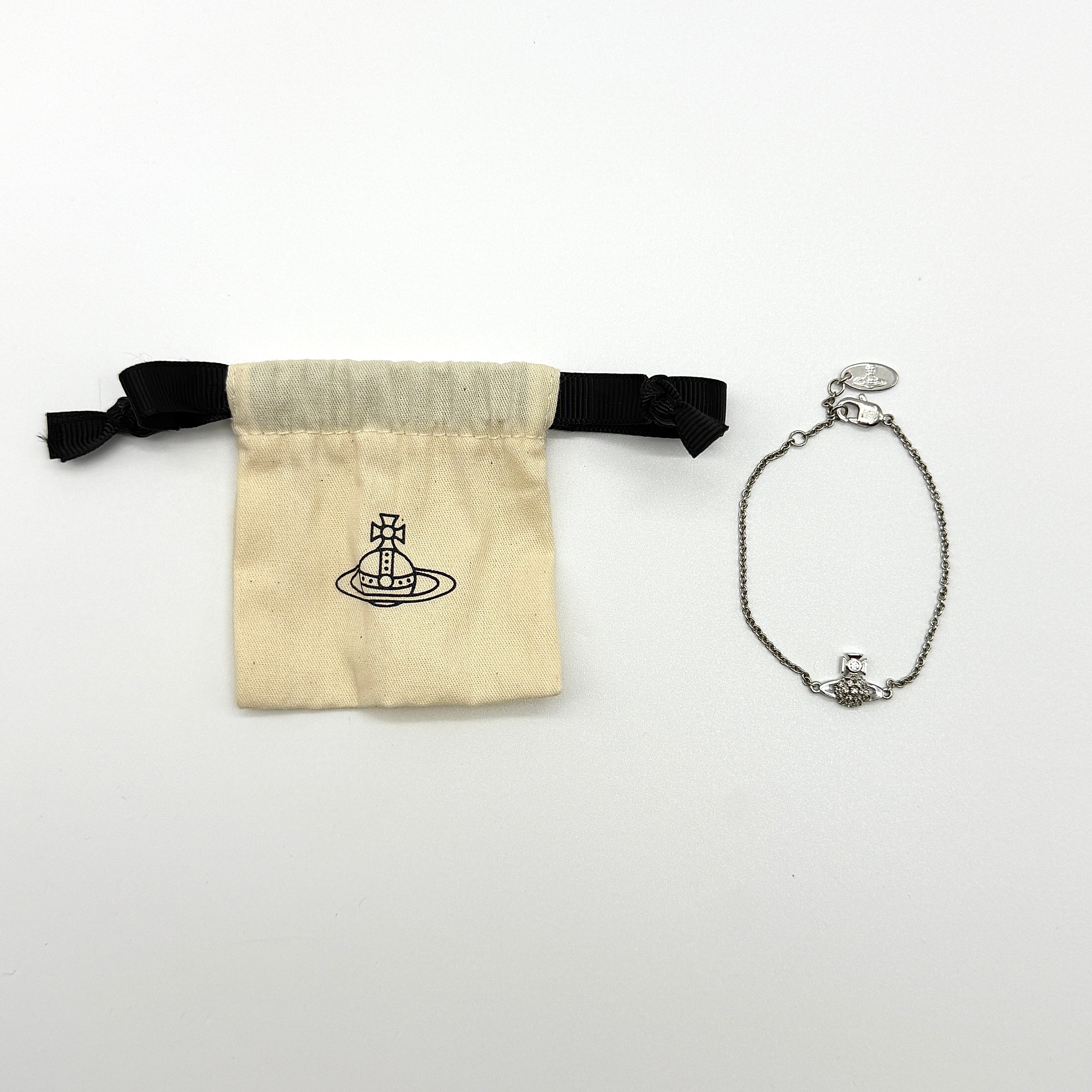 Vivienne Westwood Orb Rhinestone Bracelet in silver-tone with pavé crystal embellishments and signature orb charm