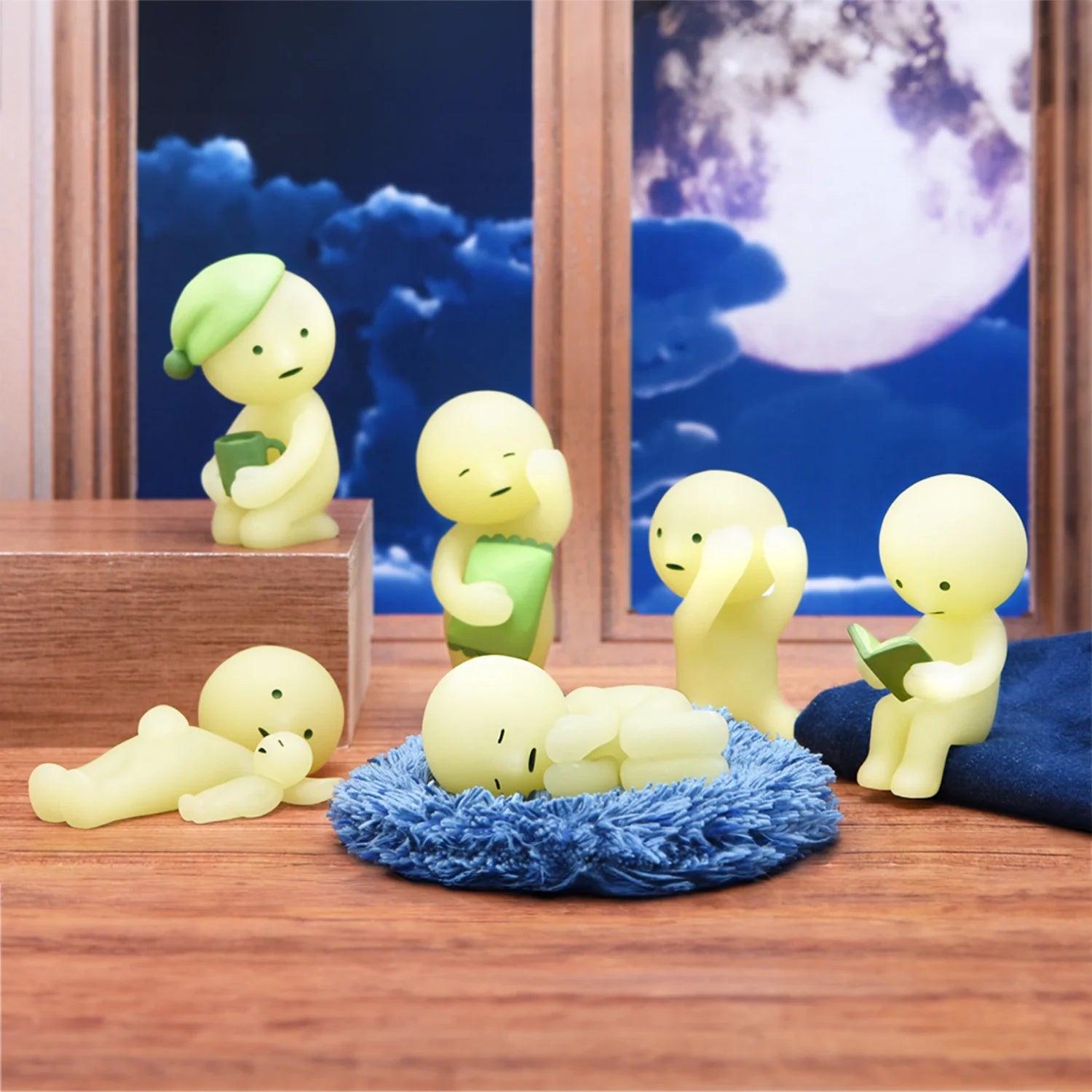 Smiski collectible figure, glow-in-the-dark mini character in quirky poses, perfect for shelves and desks.