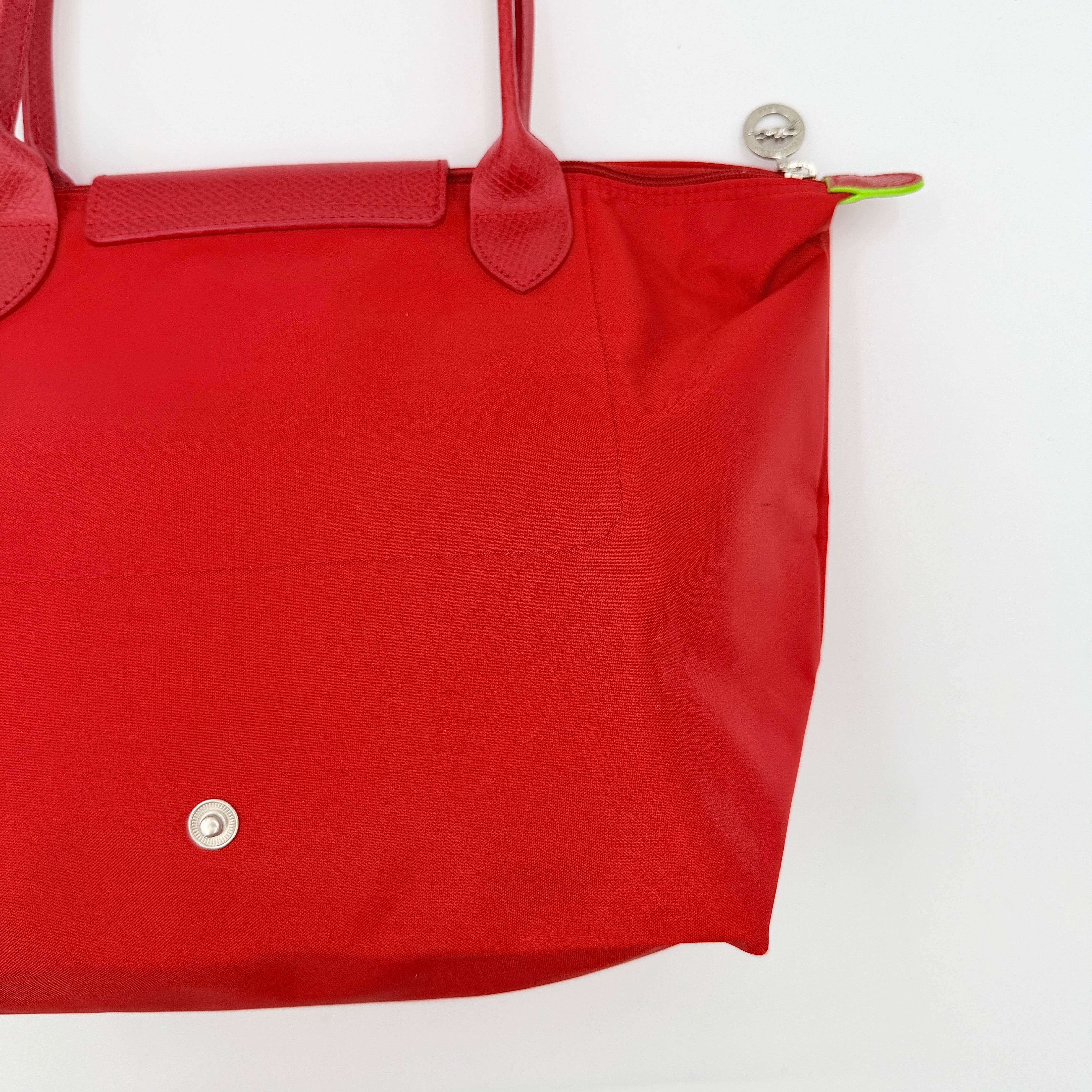 Longchamp Le Pliage Club tote bag in red nylon with tonal leather accents and silver hardware.