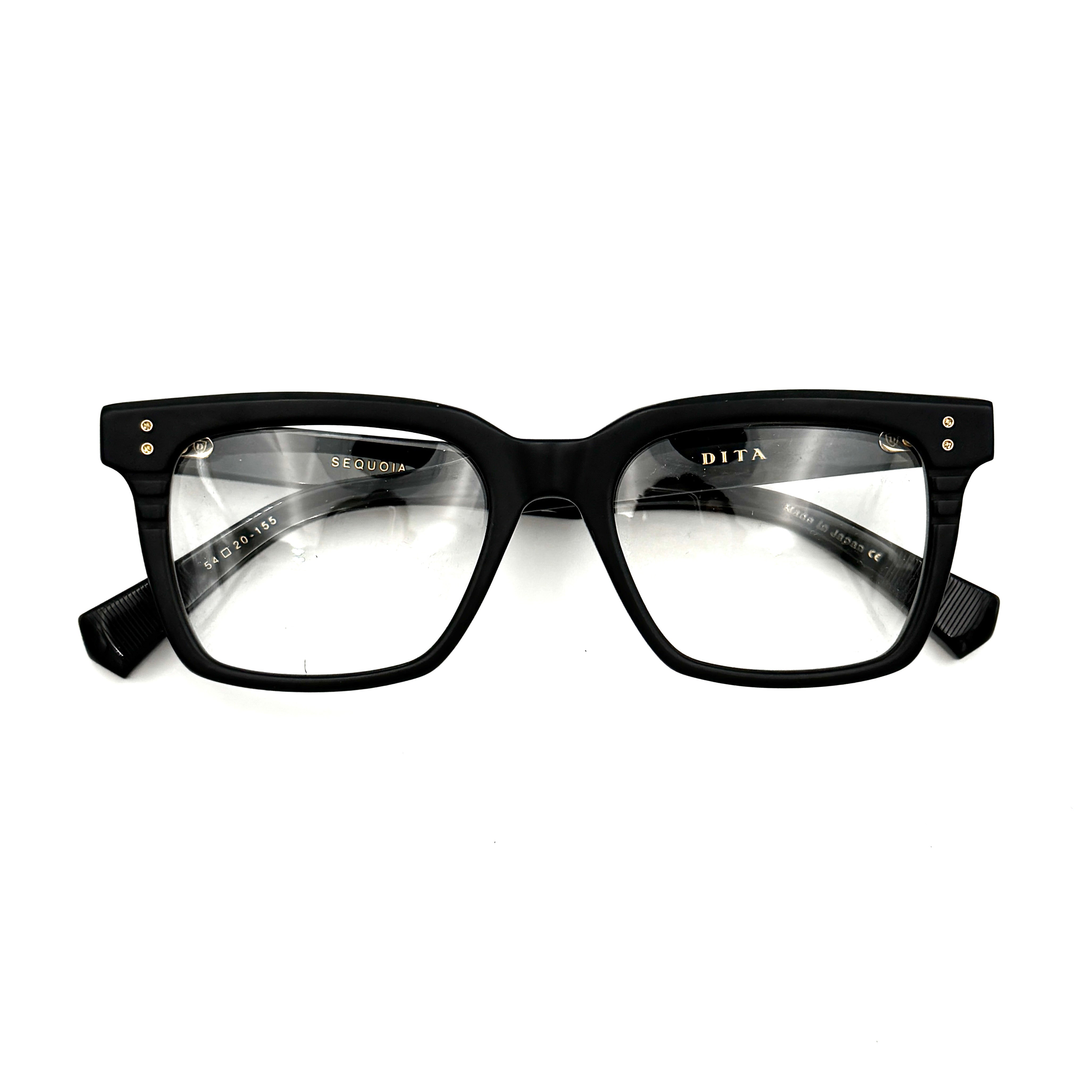 DITA Sequoia DRX-2086 black square-frame sunglasses with gold-tone accents and branded case.