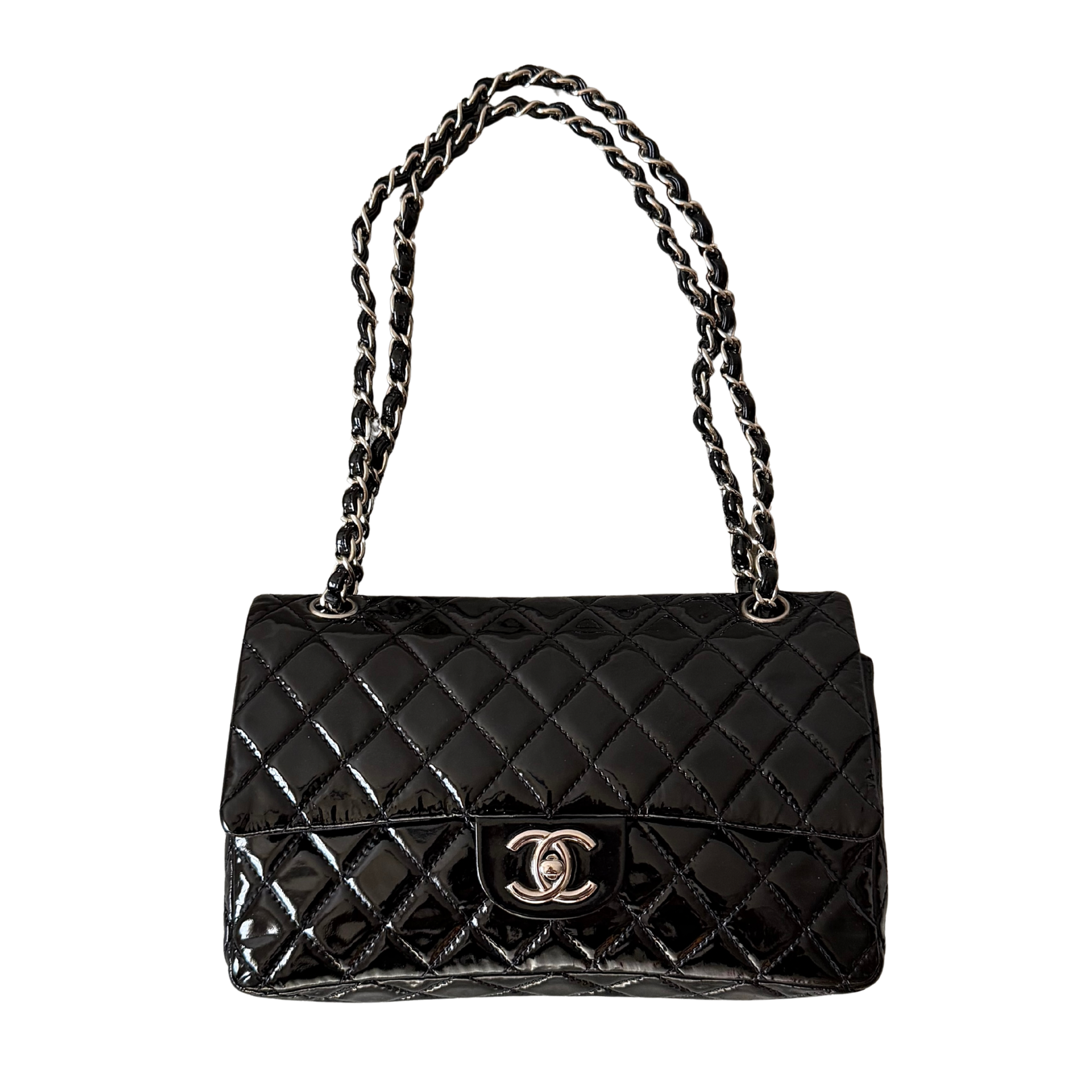 Chanel 25 Matelasse Double Flap bag in glossy black patent leather with silver-tone hardware and quilted finish.