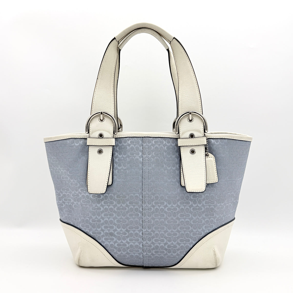 Coach Y2K Signature Soho Buckle Tote in light blue jacquard with white leather trim and silver-tone hardware.