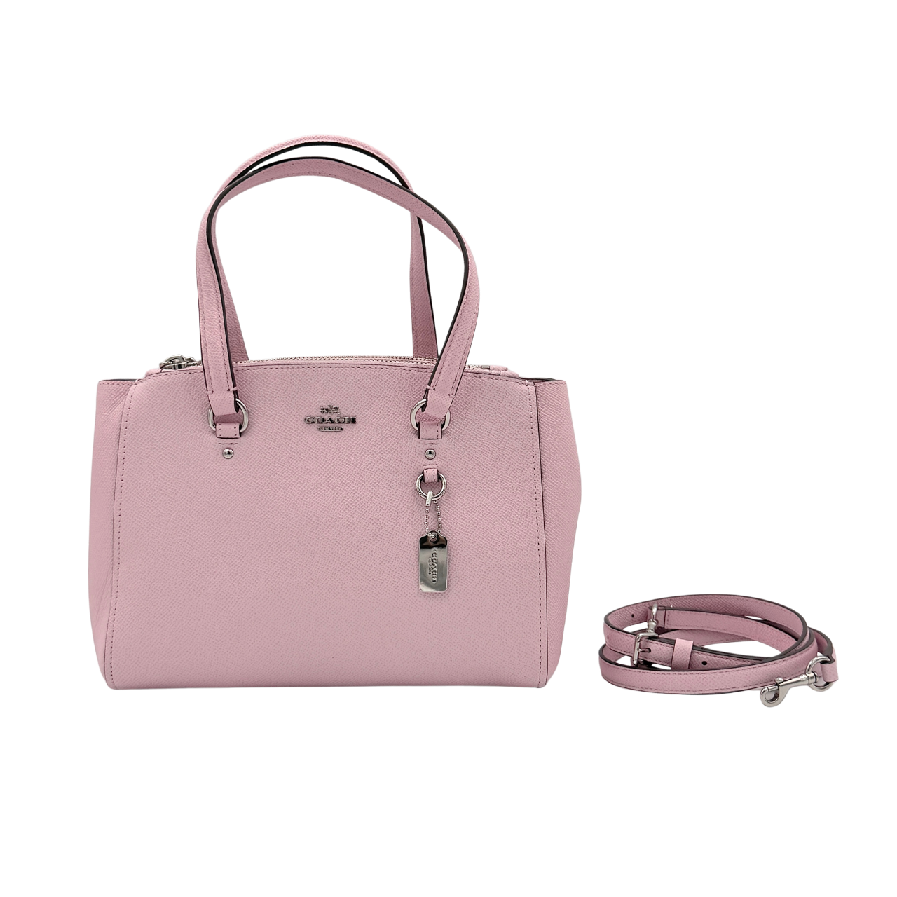 Coach Stanton 26 Carryall in blush pink grained leather with dual handles, silver hardware, and detachable strap.