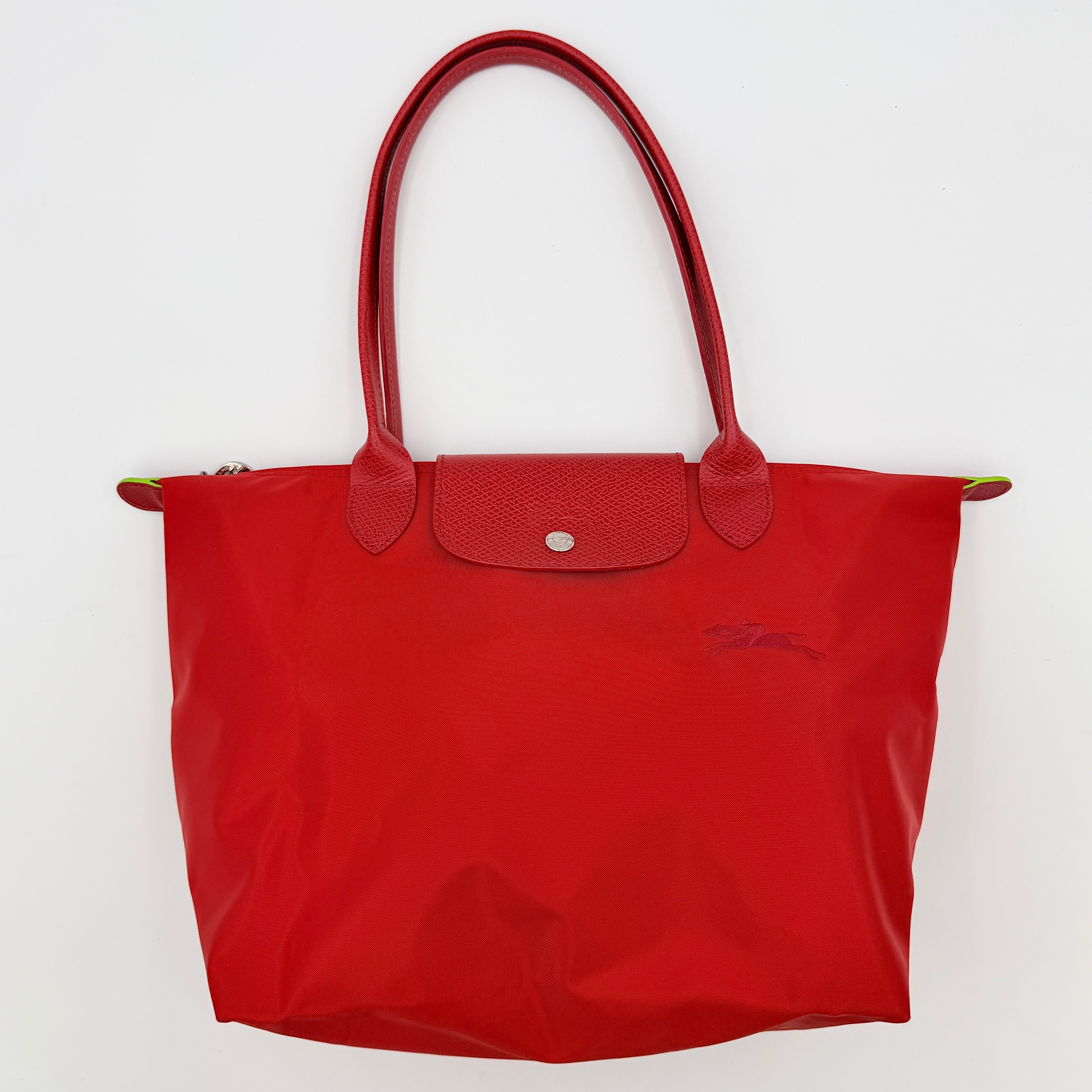 Longchamp Le Pliage Club tote bag in red nylon with tonal leather accents and silver hardware.