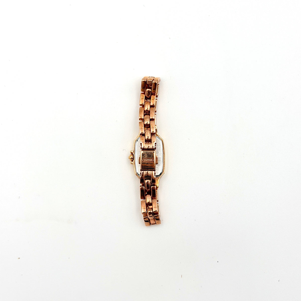 Front view of the Seiko Tisse Nozomi Special Edition watch with a pink heart motif dial and two-tone gold and rose gold bracelet.