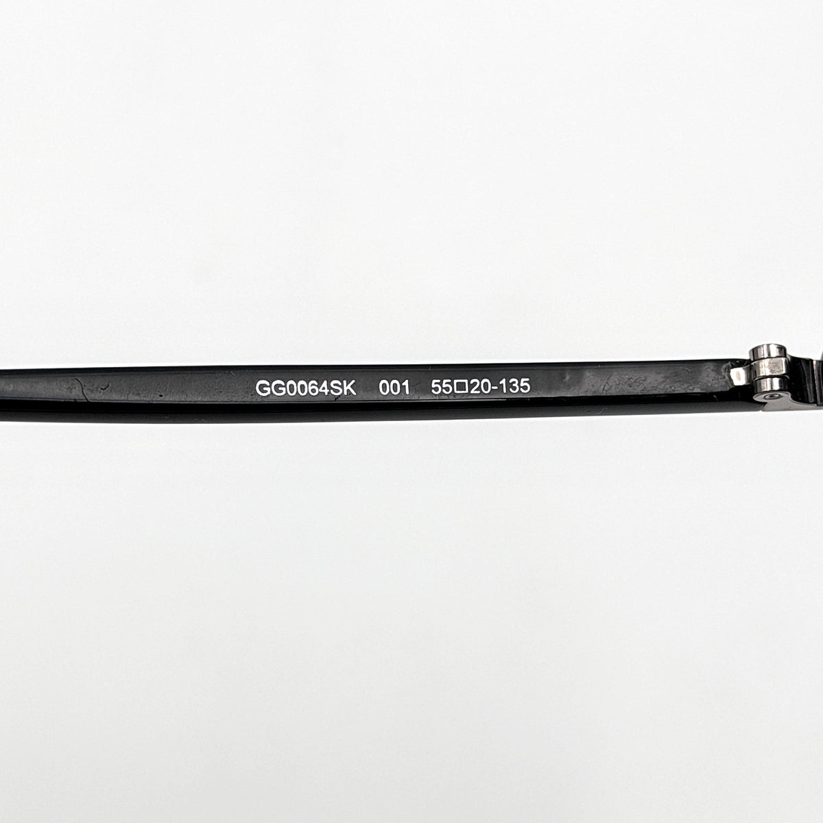 Gucci GG0064SK 001 black round sunglasses with smoky lenses, shown with original burgundy velvet case and pouch.