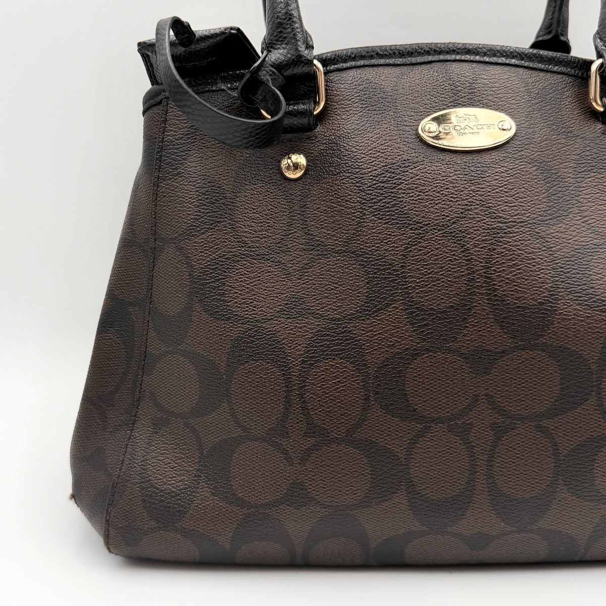 Coach 2Way Signature Margot Carryall Satchel in brown with black leather handles and gold hardware, shown with detachable strap.
