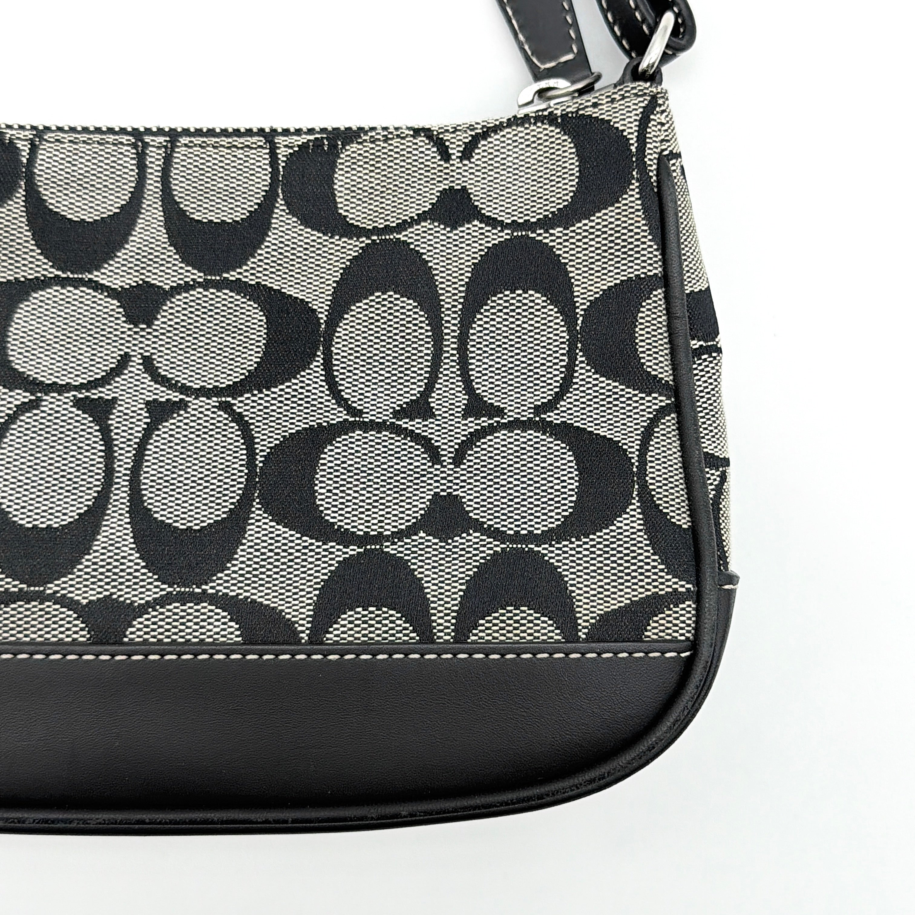 Coach Y2K Demi Shoulder Bag in grey and black signature jacquard with leather trim and silver hardware.