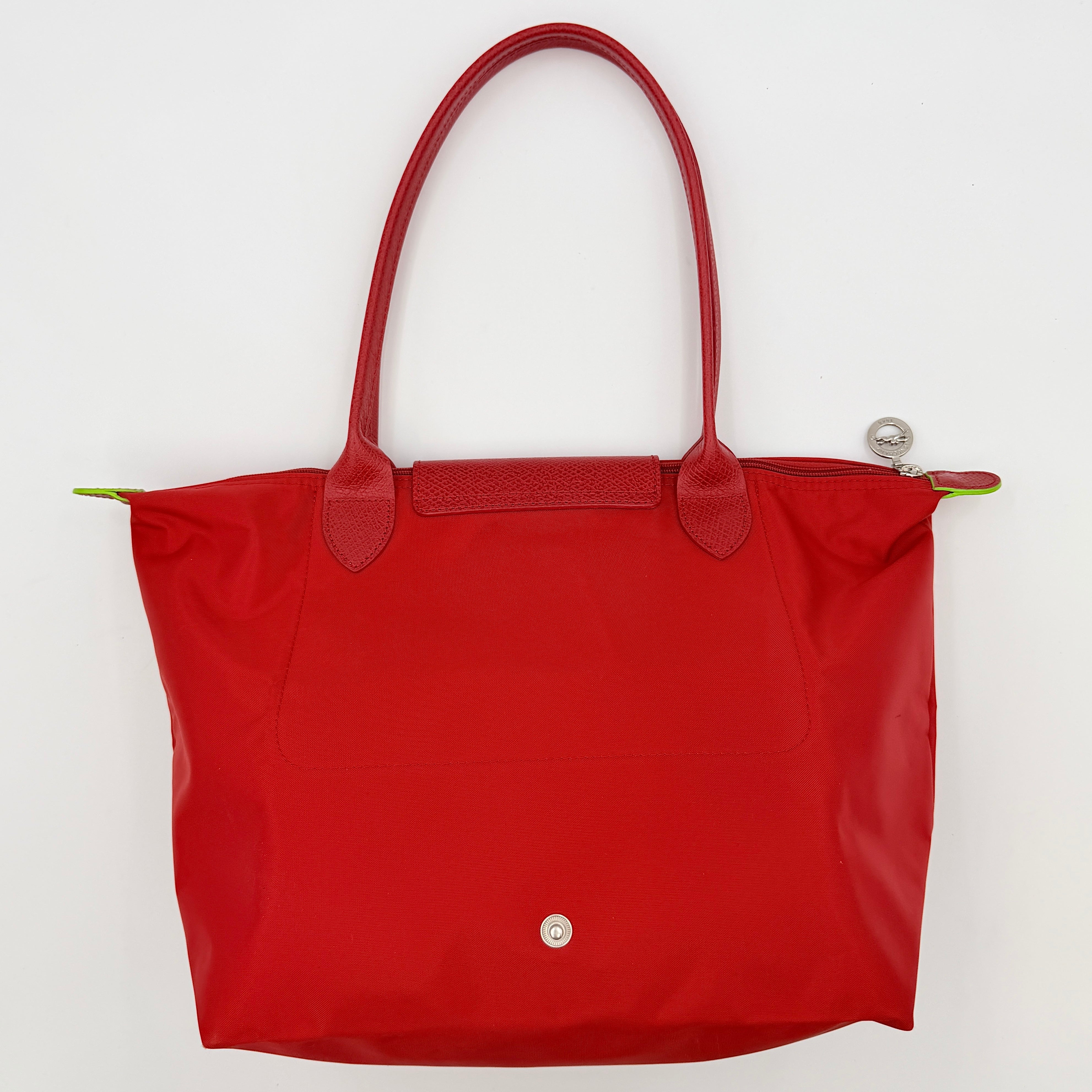 Longchamp Le Pliage Club tote bag in red nylon with tonal leather accents and silver hardware.