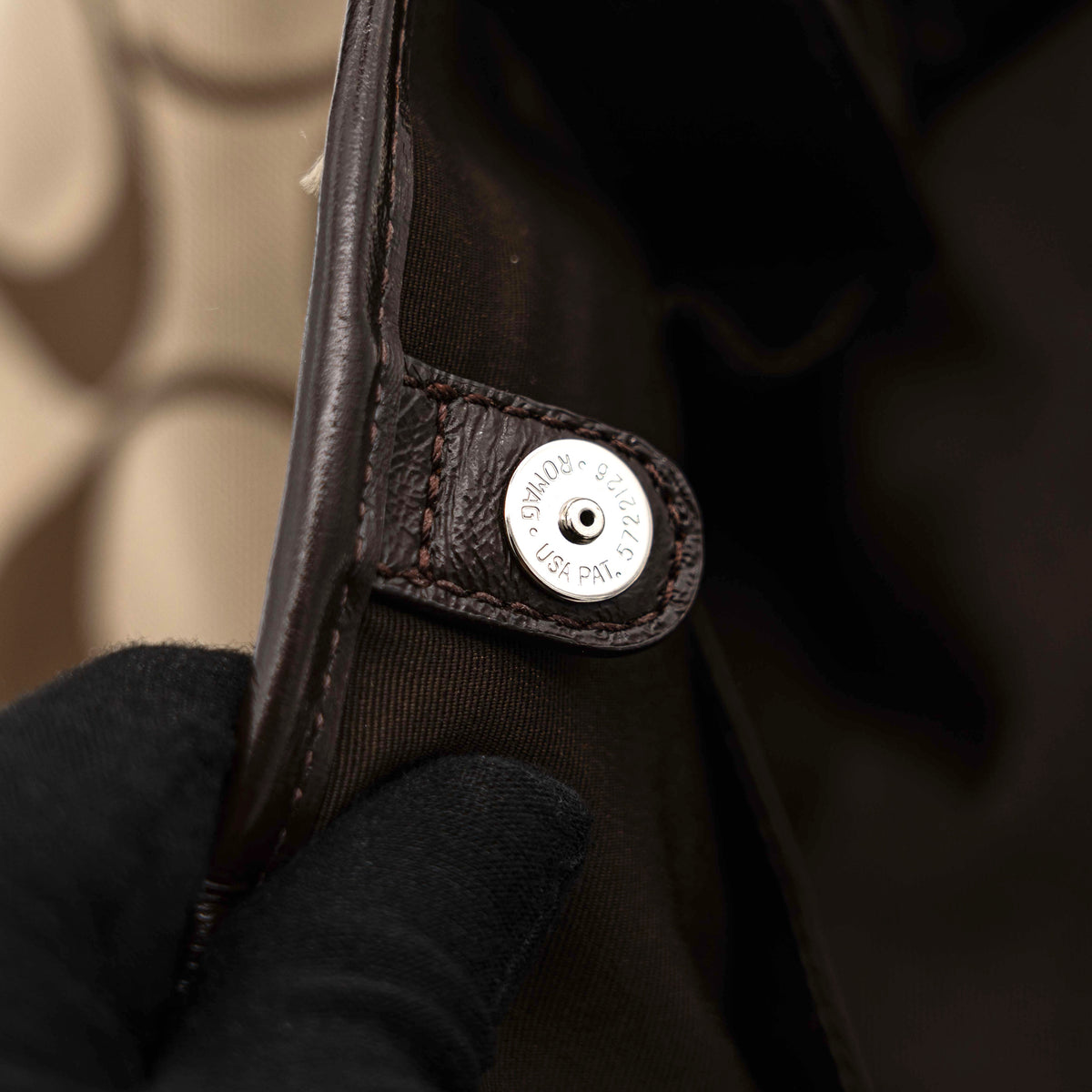 Coach Signature Stripe Frame Kisslock Shoulder Bag in beige and brown canvas with leather trim and signature monogram pattern.