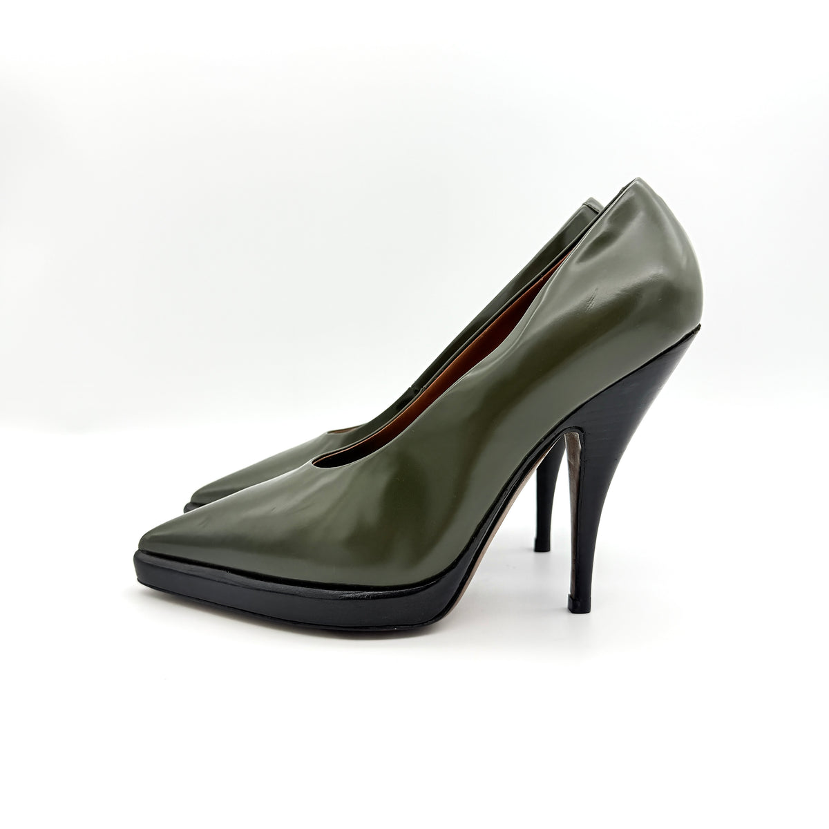 Celine olive green leather heels with pointed toe and black stiletto heel, displayed against a white background