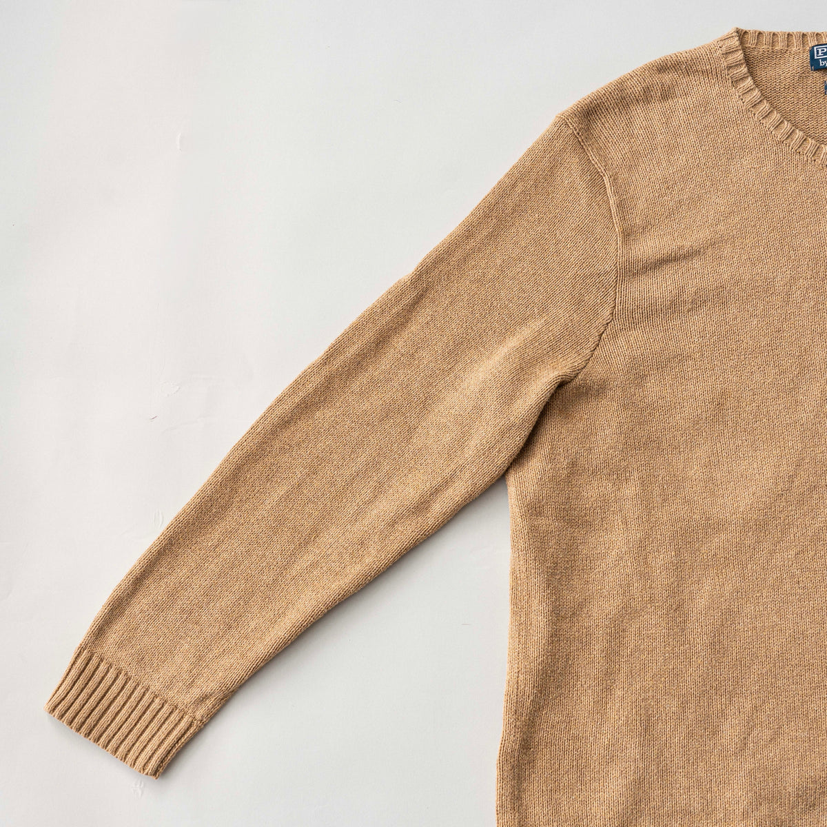 Polo Ralph Lauren brown Pima cotton knit crewneck sweater with embroidered pony logo, displayed flat.