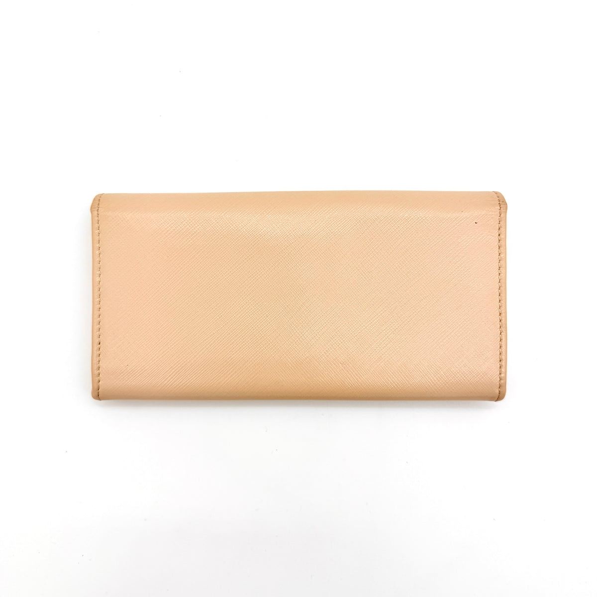 Salvatore Ferragamo light pink Saffiano wallet with gold Gancini hardware, shown on a white background.