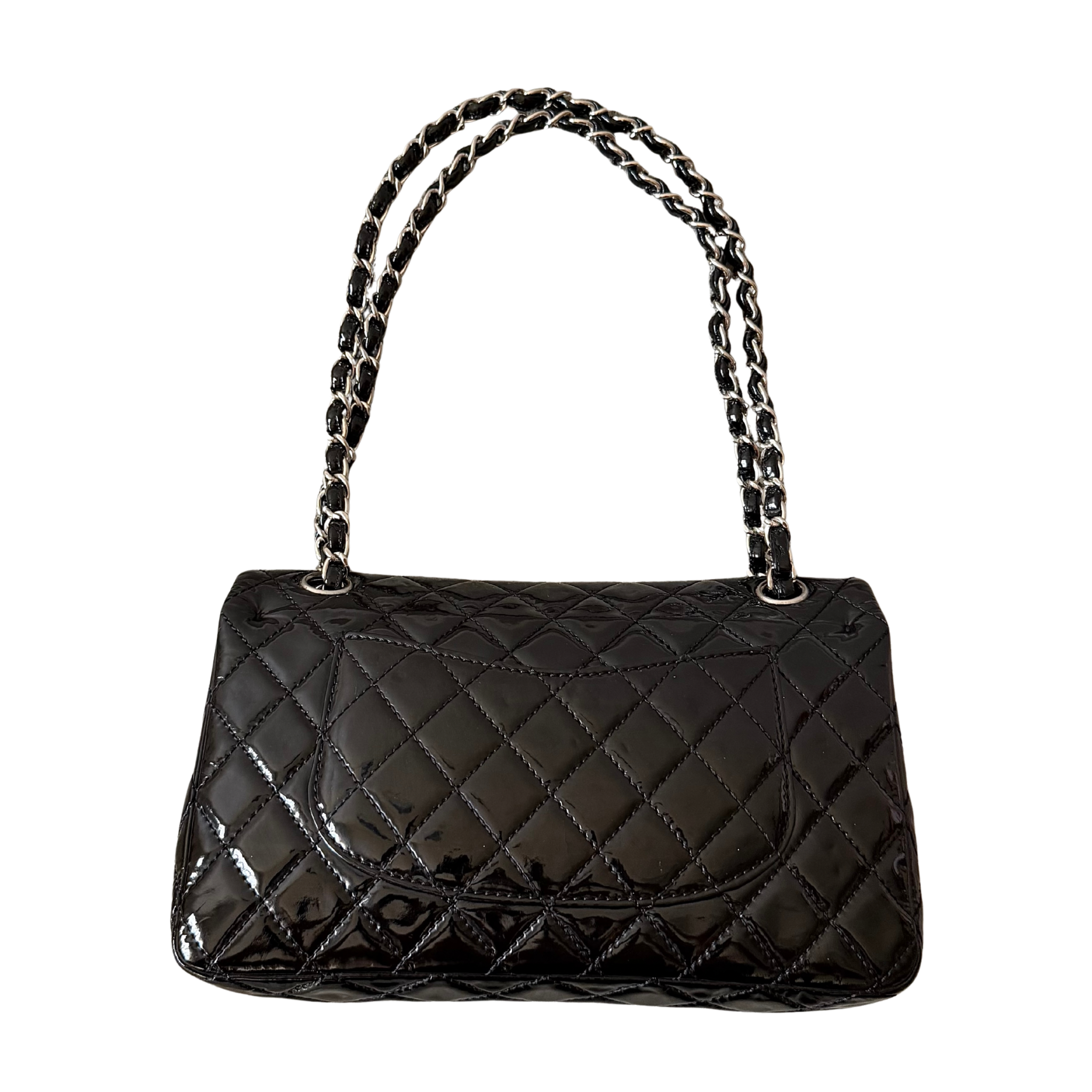 Chanel 25 Matelasse Double Flap bag in glossy black patent leather with silver-tone hardware and quilted finish.