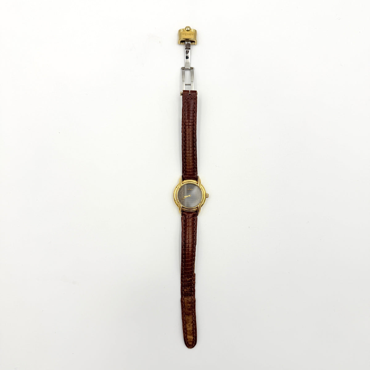 Fendi 350L Orologi Quartz Watch in gold with brown leather strap, displayed with original box and booklet.