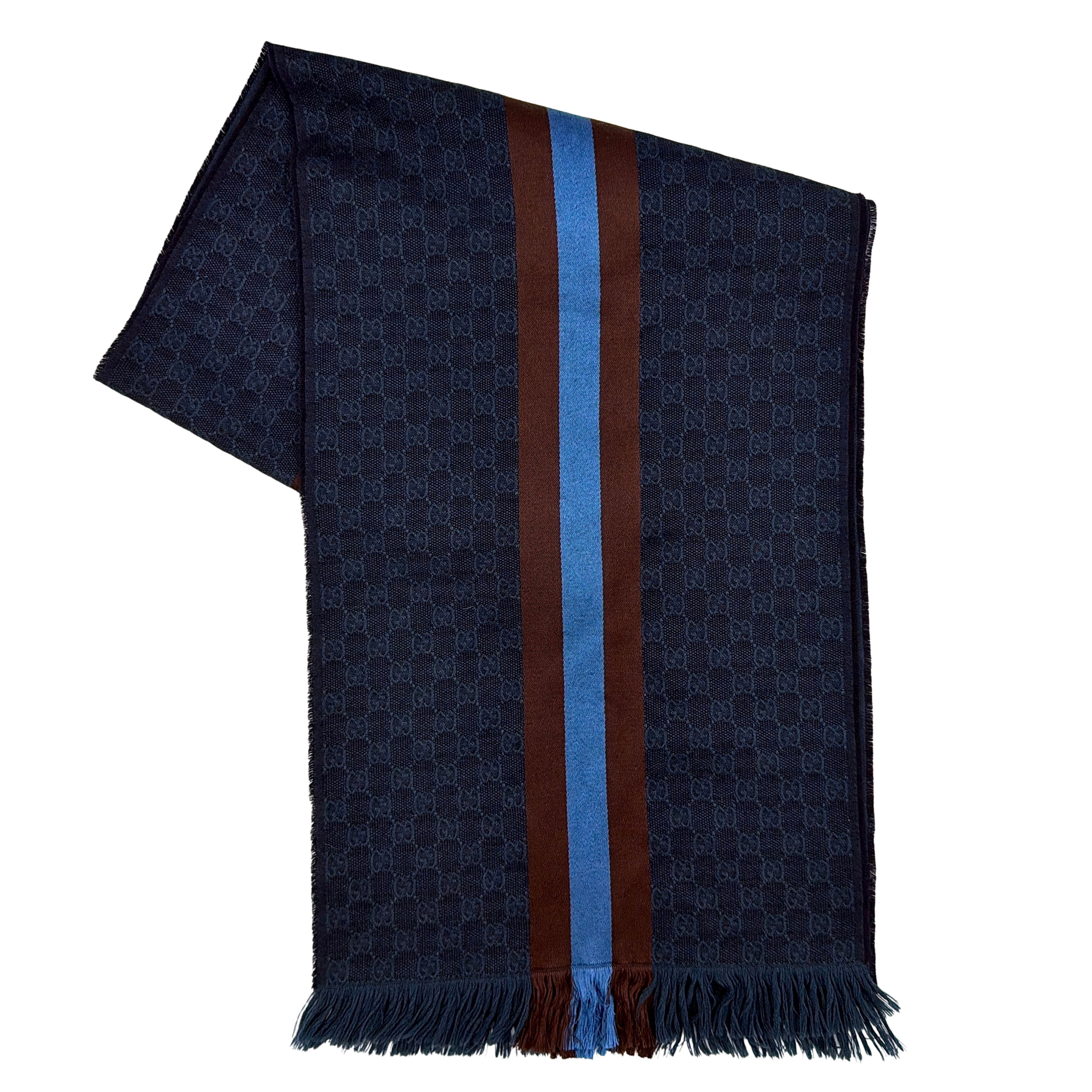 Gucci GG Monogram navy blue scarf with brown and blue Sherry Web stripes and fringed edges, artfully arranged to showcase its luxurious texture.