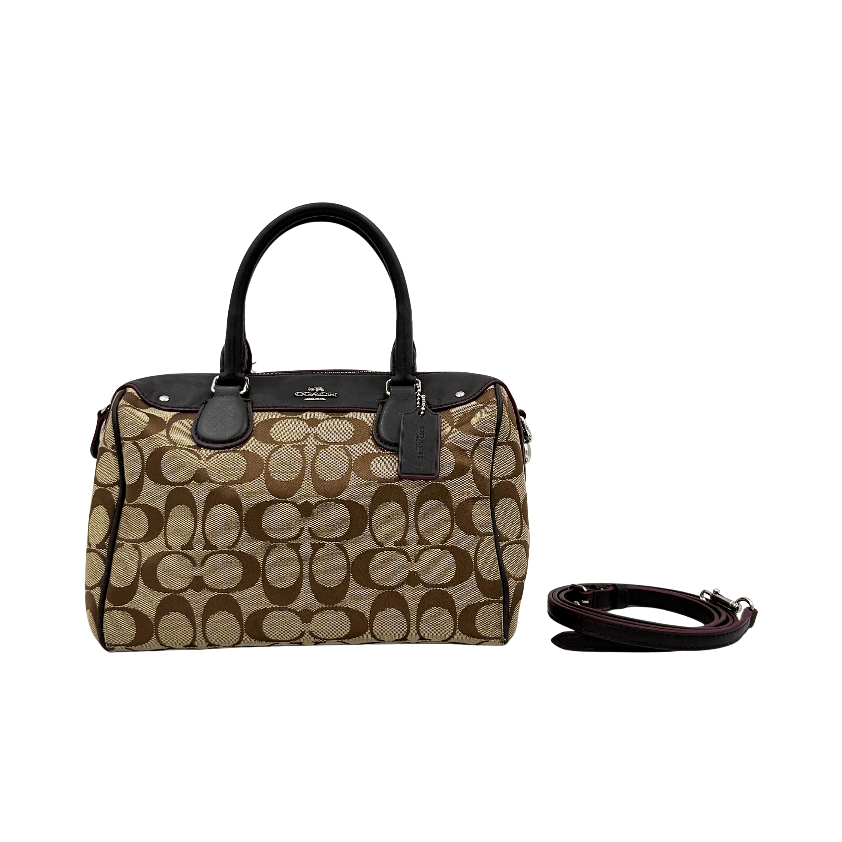 Coach Mini Bennett Boston Bag in beige monogram canvas with brown leather trim, dual handles, and detachable crossbody strap.