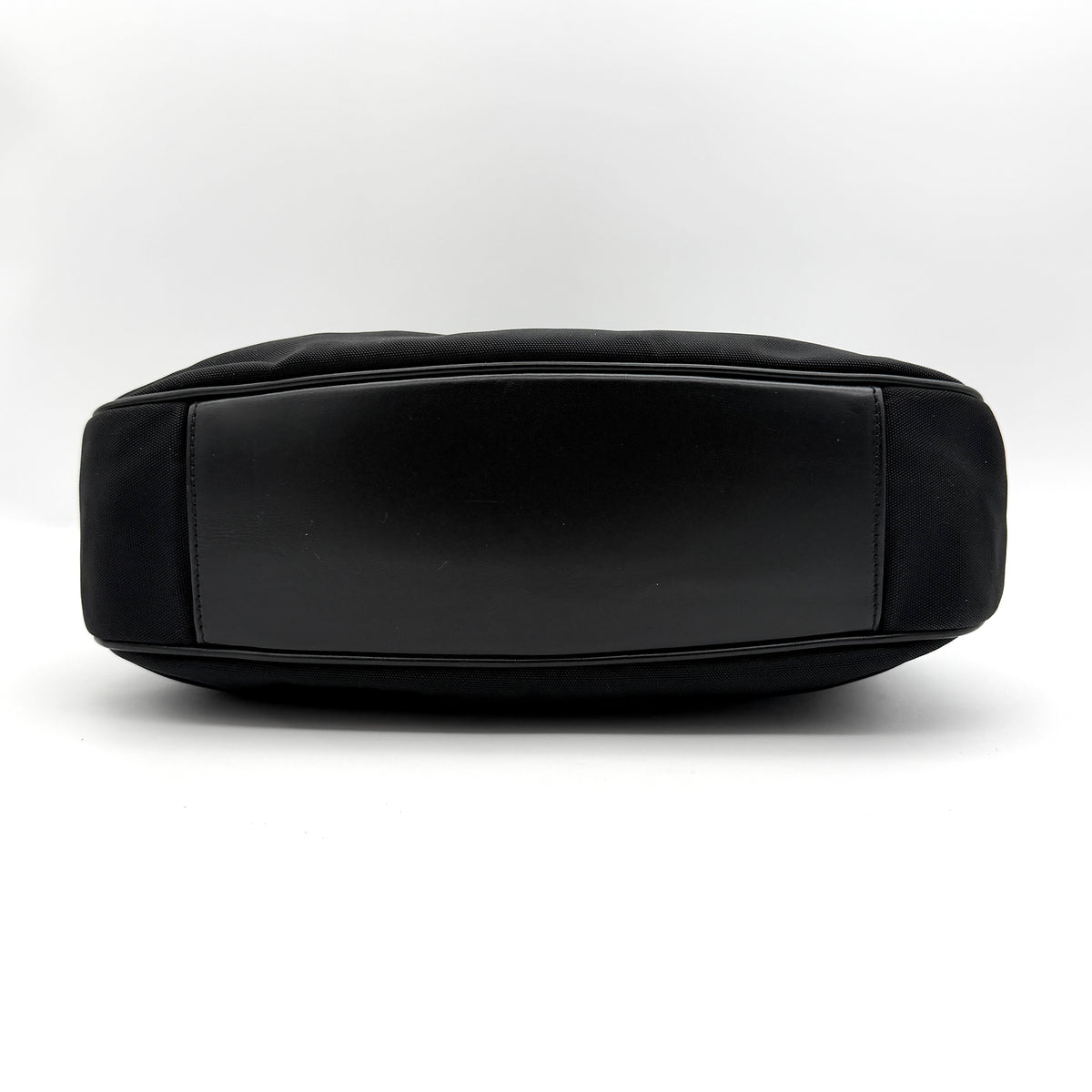 Gucci black nylon shoulder bag with bamboo handle and detachable strap shown with dust bag.