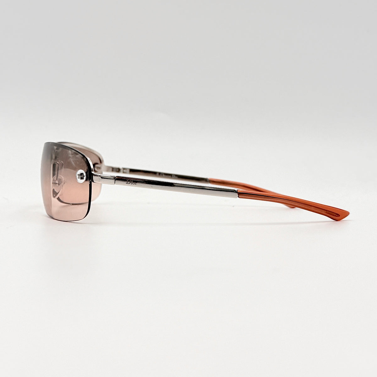 Dior Adiorable 3/L rimless sunglasses with rose pink gradient lenses and silver frame, presented with Dior hard case.