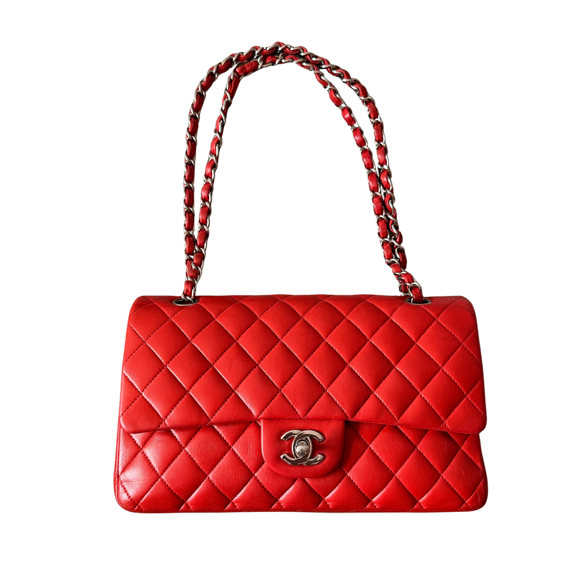 Chanel double flap shoulder bag in quilted red leather with silver-tone hardware and chain leather strap.