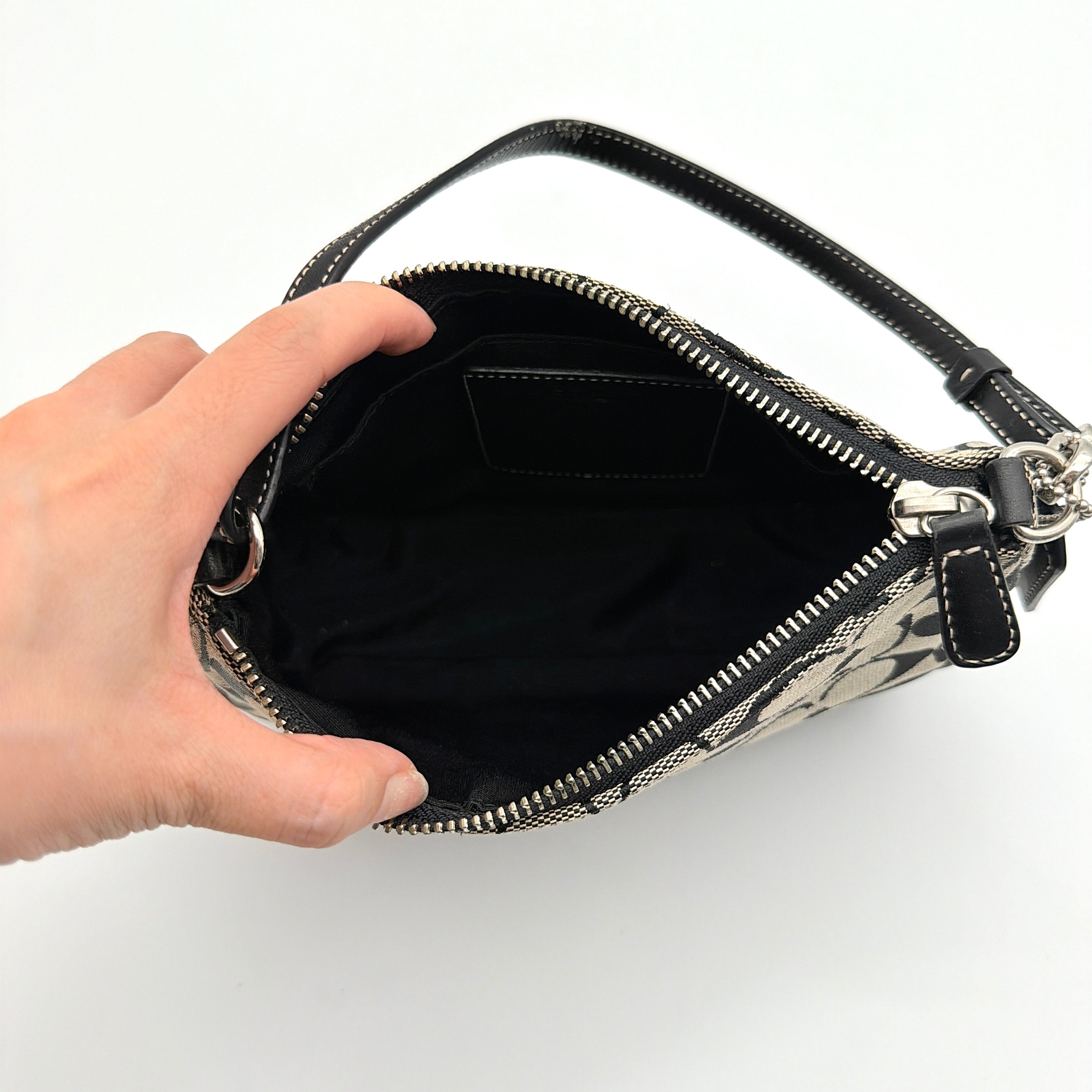 Coach Y2K Demi Shoulder Bag in grey and black signature jacquard with leather trim and silver hardware.