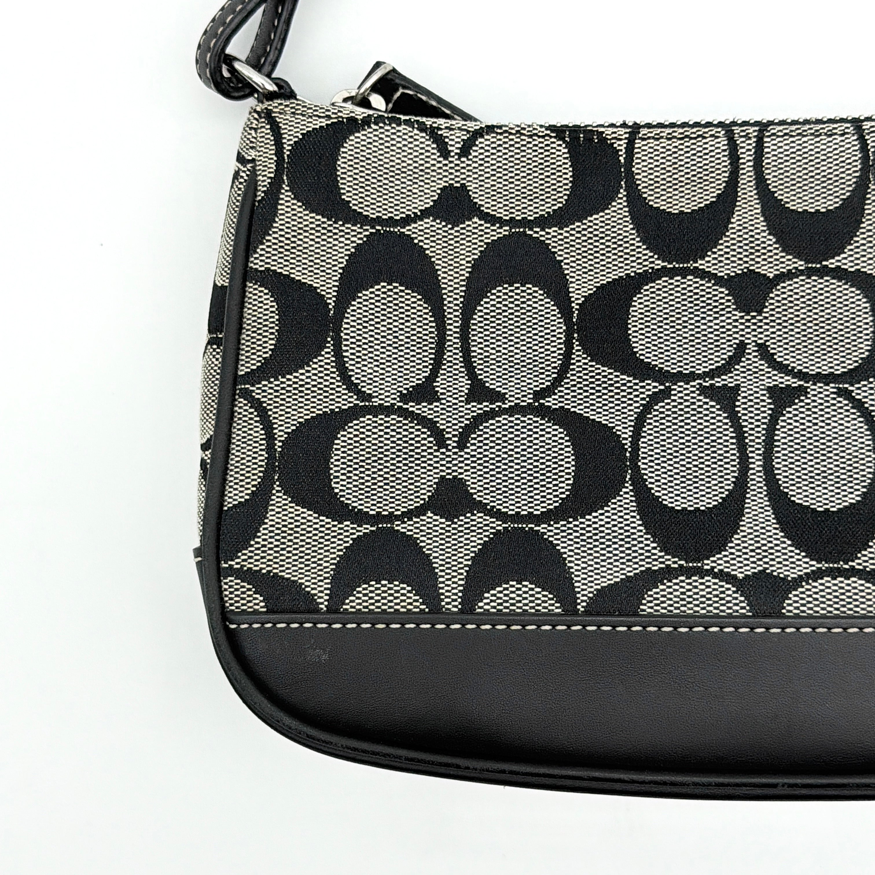 Coach Y2K Demi Shoulder Bag in grey and black signature jacquard with leather trim and silver hardware.