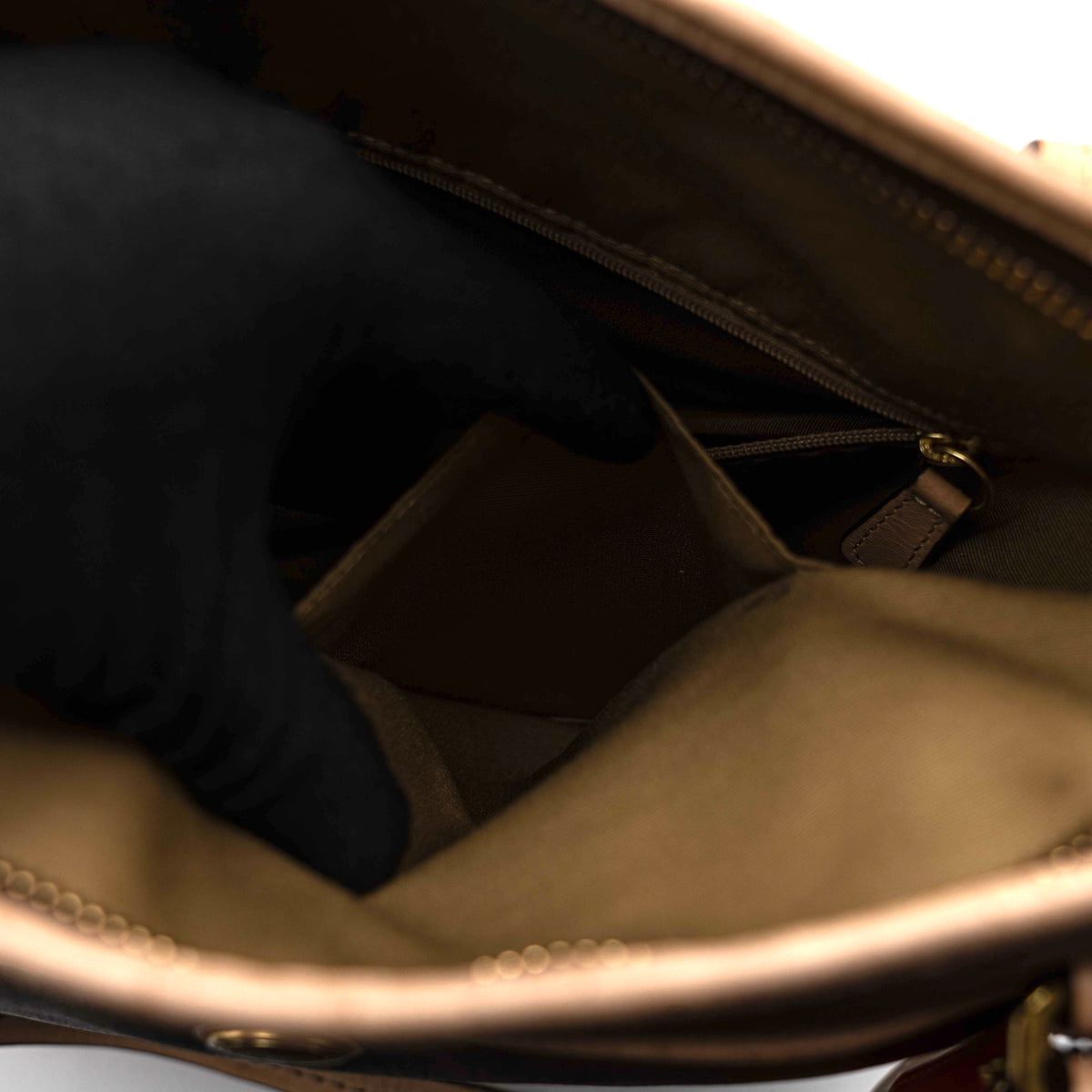 Coach Signature Peyton Pocket tote bag in brown canvas with tan leather trim, shown with both handles and detachable strap.
