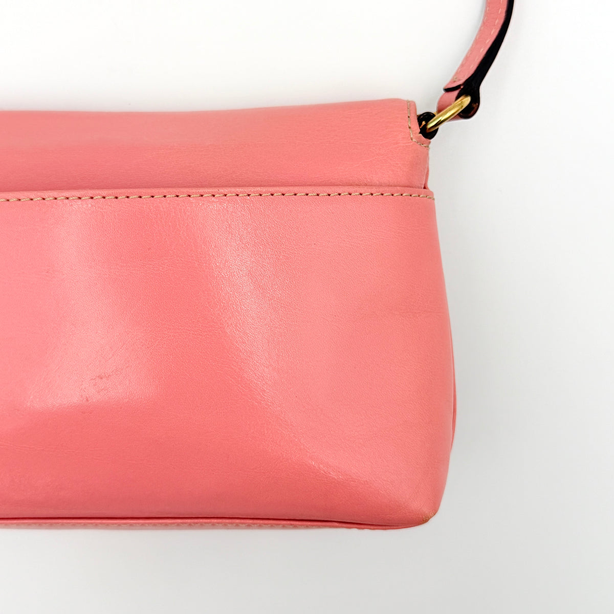Kate Spade Morgan East West Shoulder Bag in smooth pink leather with gold-tone hardware and a green interior, displayed on white background.