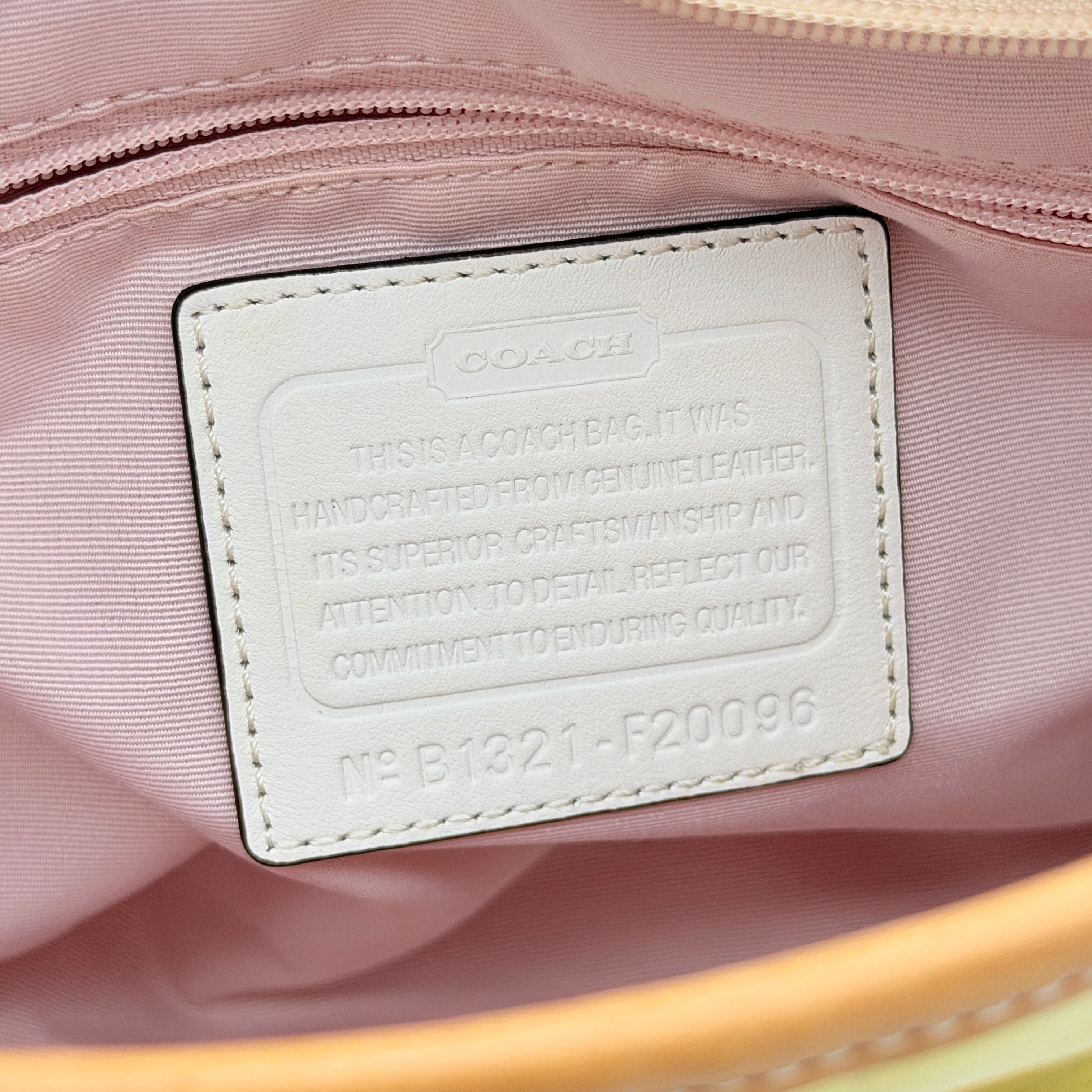 Coach Peyton tote in glossy yellow patent leather with tan handles and detachable strap, shown with blush pink interior.