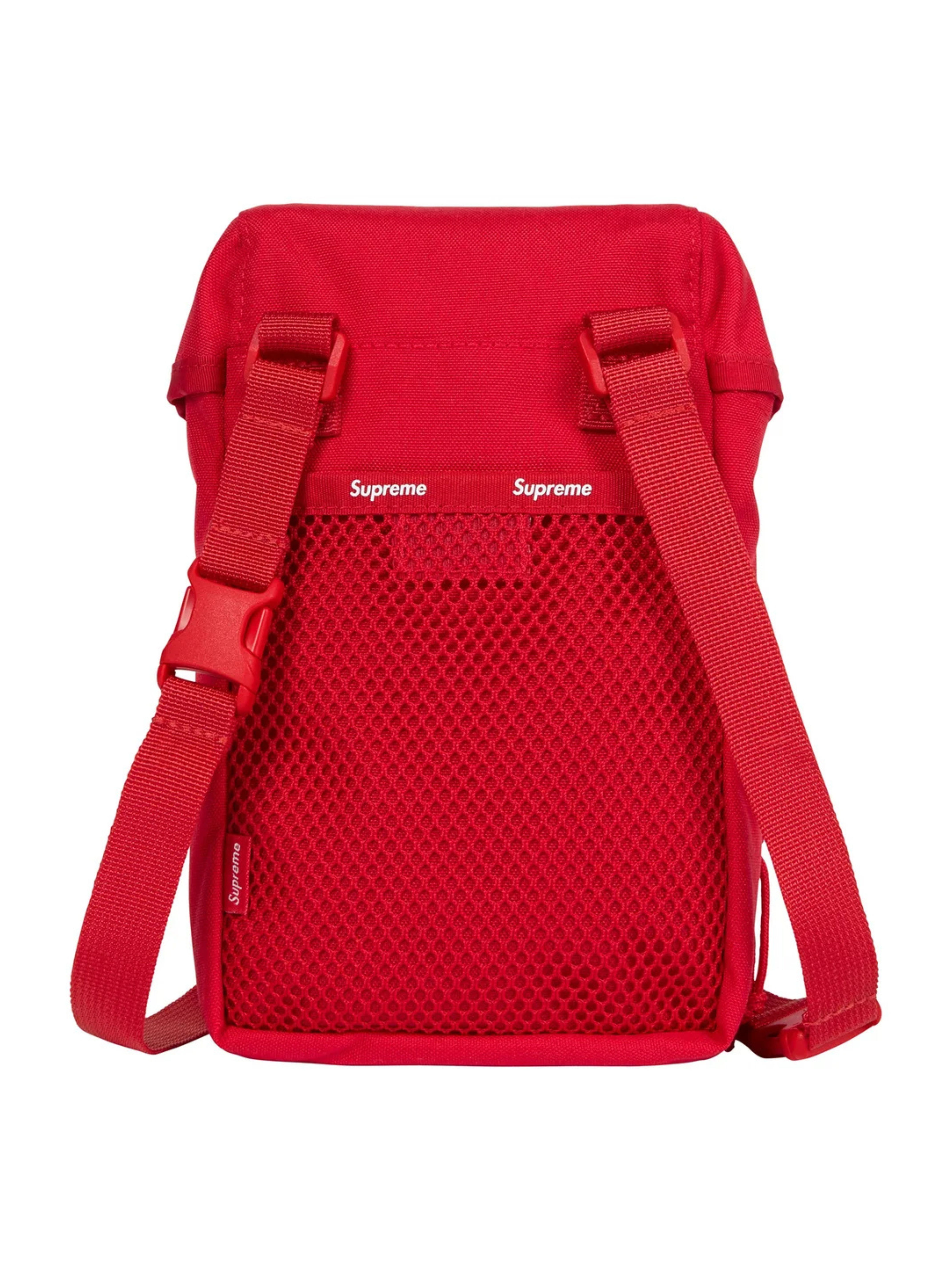 Supreme Camera Bag Red FW24 made from Cordura nylon, with reflective strip, buckle flap, and white box logo