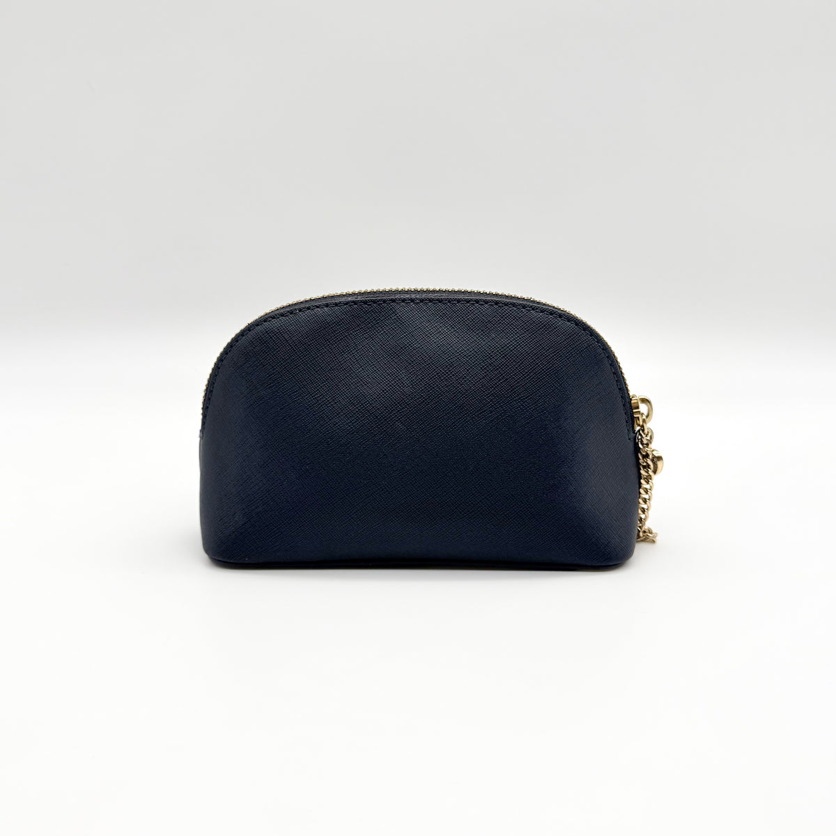 Front view of the Michael Kors black saffiano leather dome cosmetic pouch with gold-tone hardware.