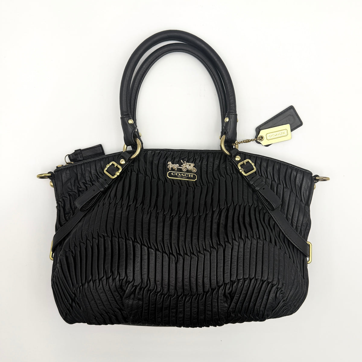 Coach Sophia Madison Pleated Shoulder Bag in black leather with gold hardware, displayed with detachable strap and dust bag.