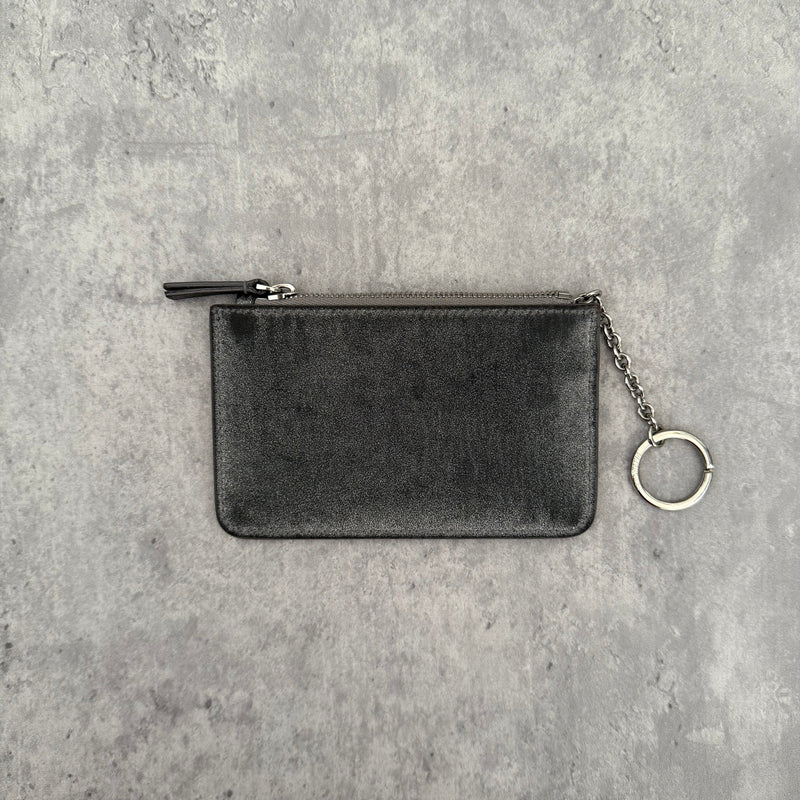 Balenciaga Graphic Print Silver Wallet, metallic silver leather with bold black logo and zip closure with keyring chain.