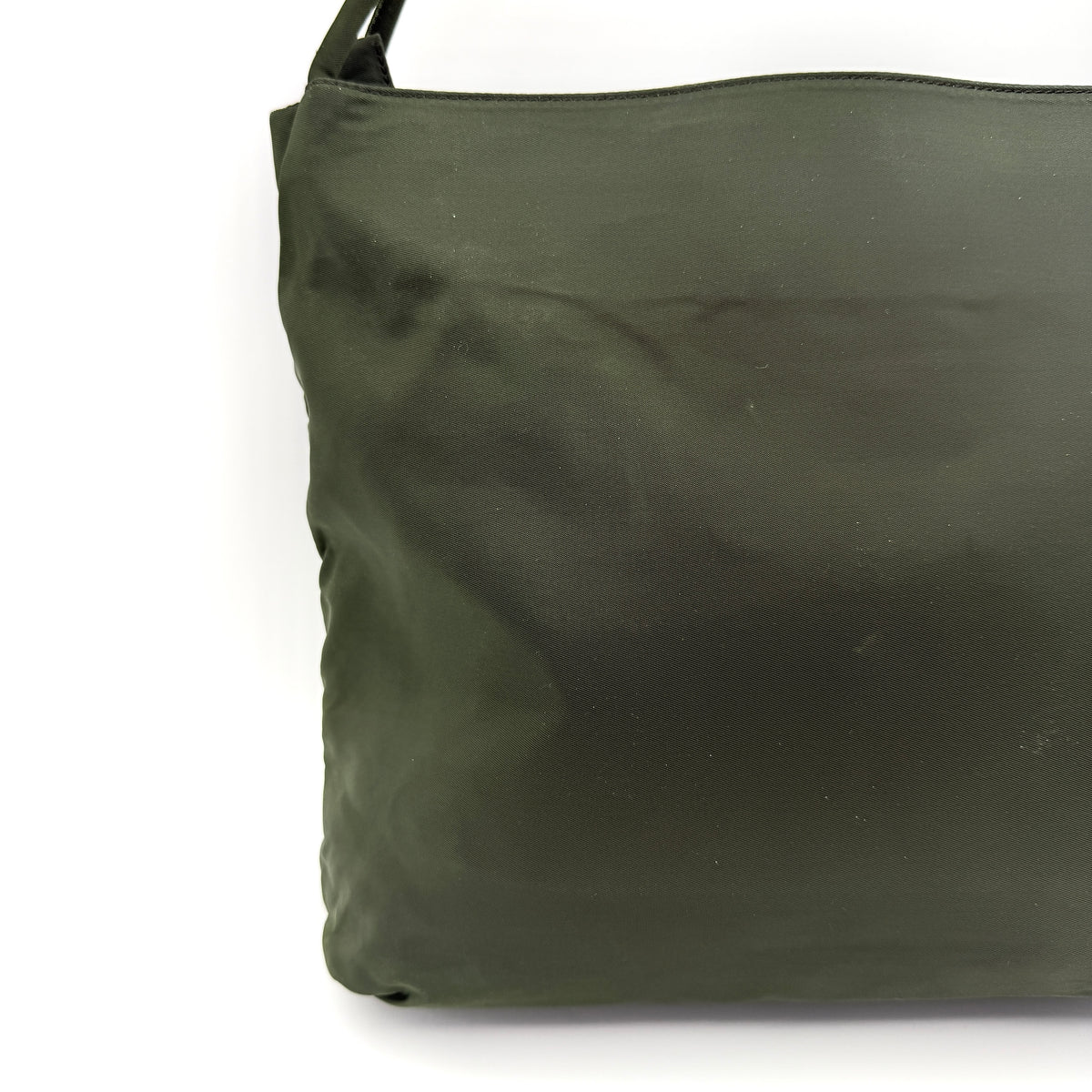 Prada Tessuto Nylon City Tote Bag in dark green nylon with double handles and signature triangle logo plaque on the front.