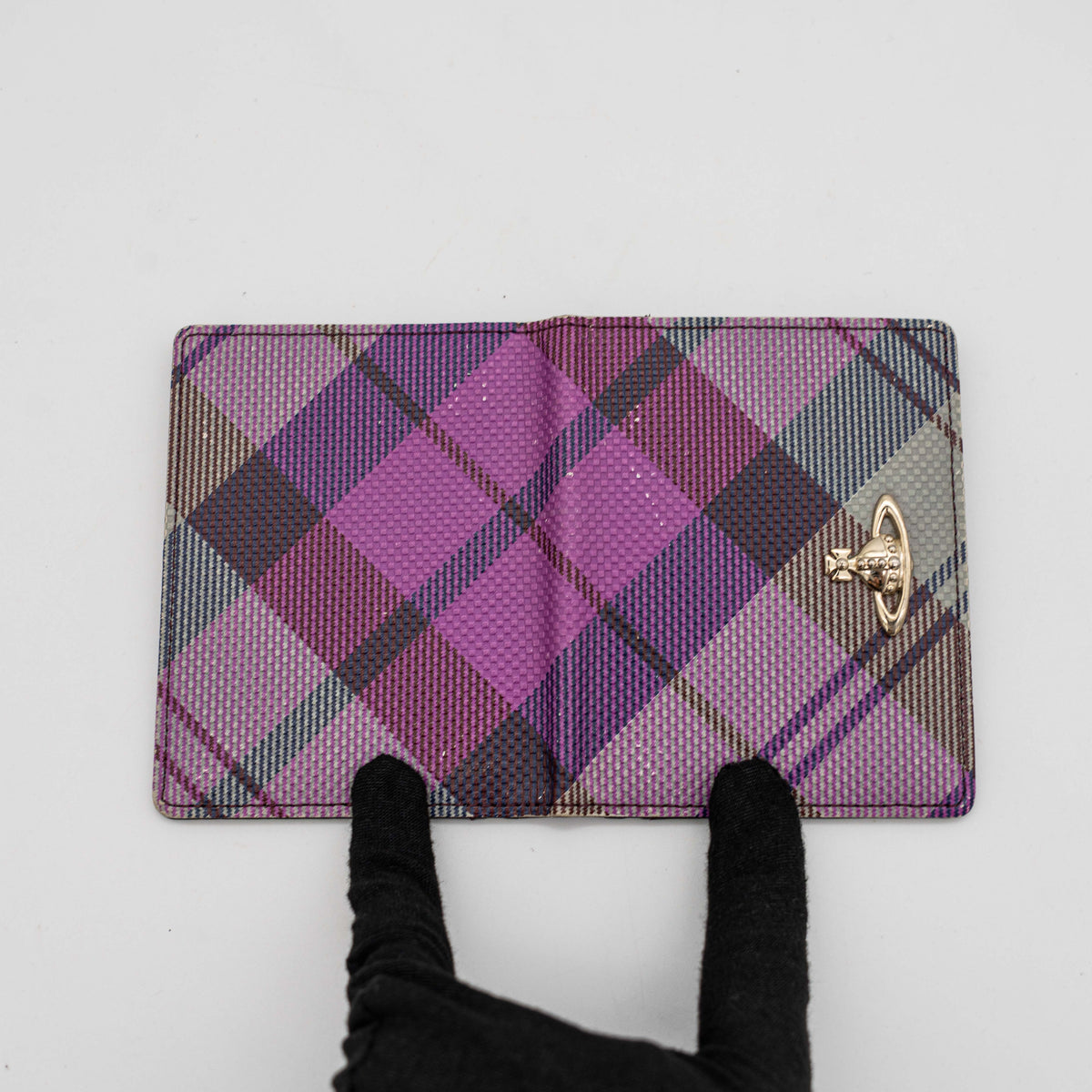 Vivienne Westwood card case in purple tartan canvas with gold Orb logo and burgundy leather interior.