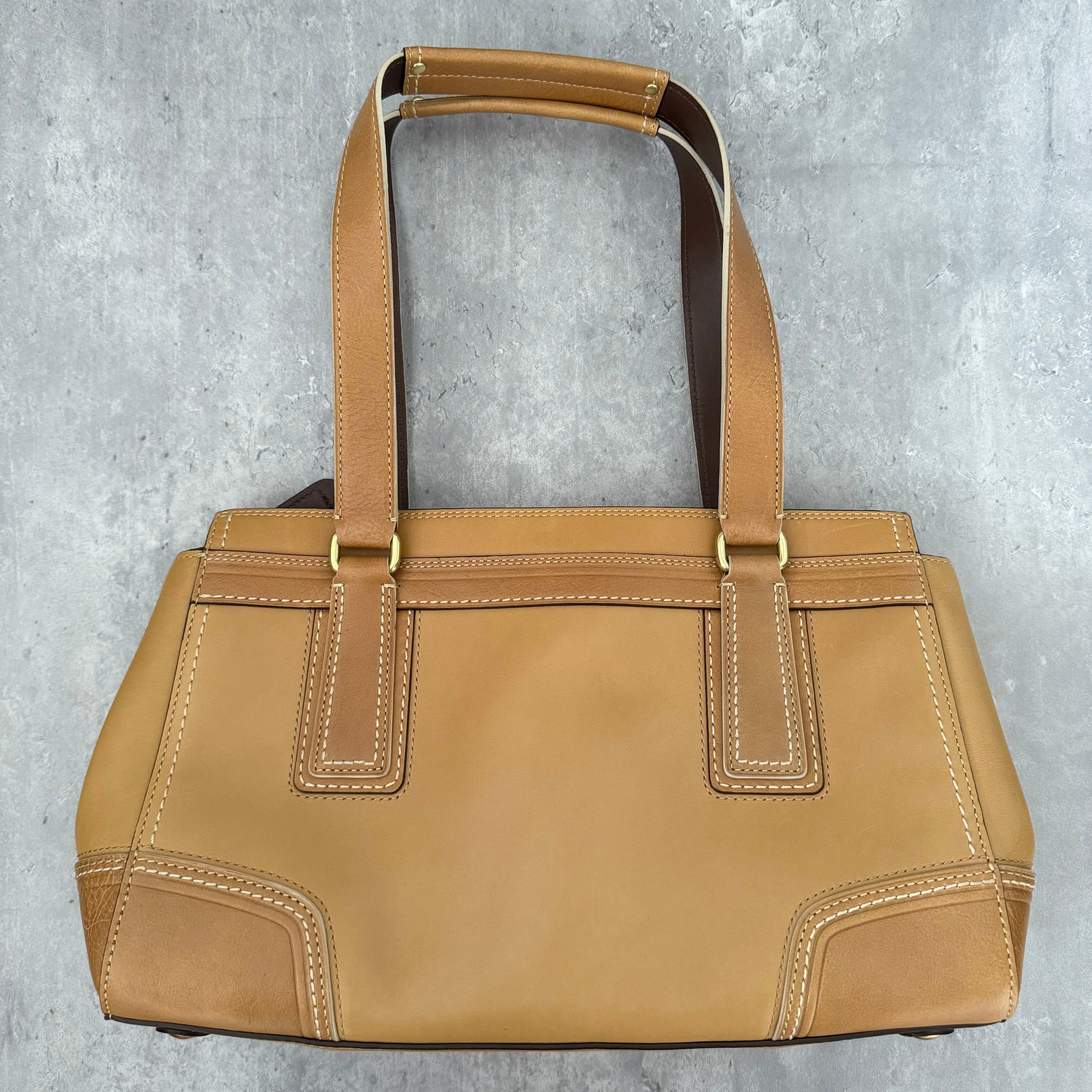 Coach Hampton Vintage Brown Beige Tan Handbag, crafted in leather with embossed signature panel, patent leather stripes, gold-tone hardware, and dual shoulder straps.