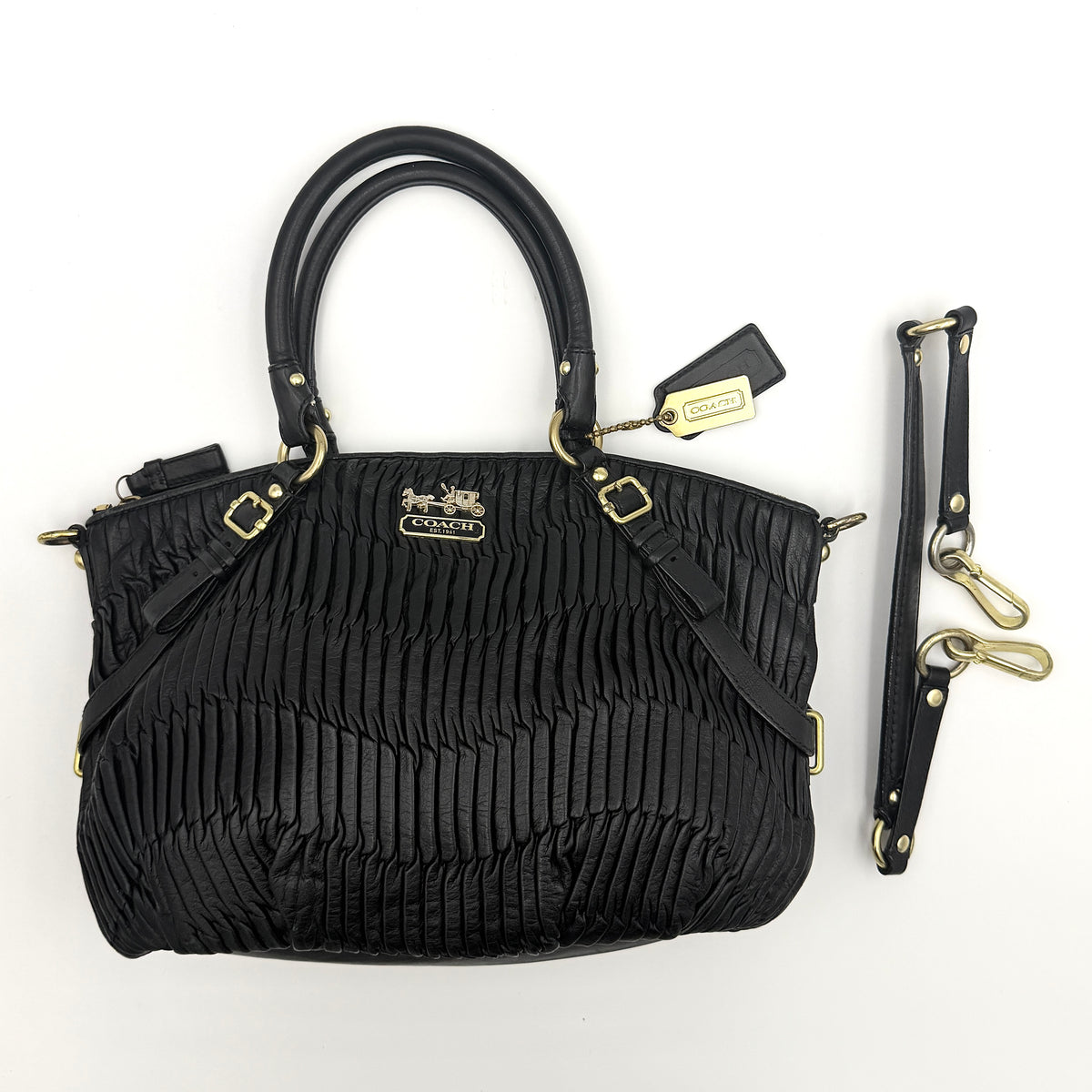 Coach Sophia Madison Pleated Shoulder Bag in black leather with gold hardware, displayed with detachable strap and dust bag.