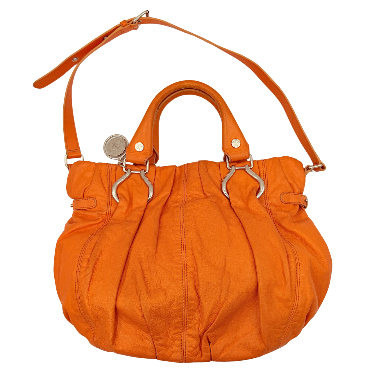 Celine 2Way Shoulder Bag in vibrant orange leather with silver-tone hardware and pleated detailing, shown with both top handles and an adjustable strap.