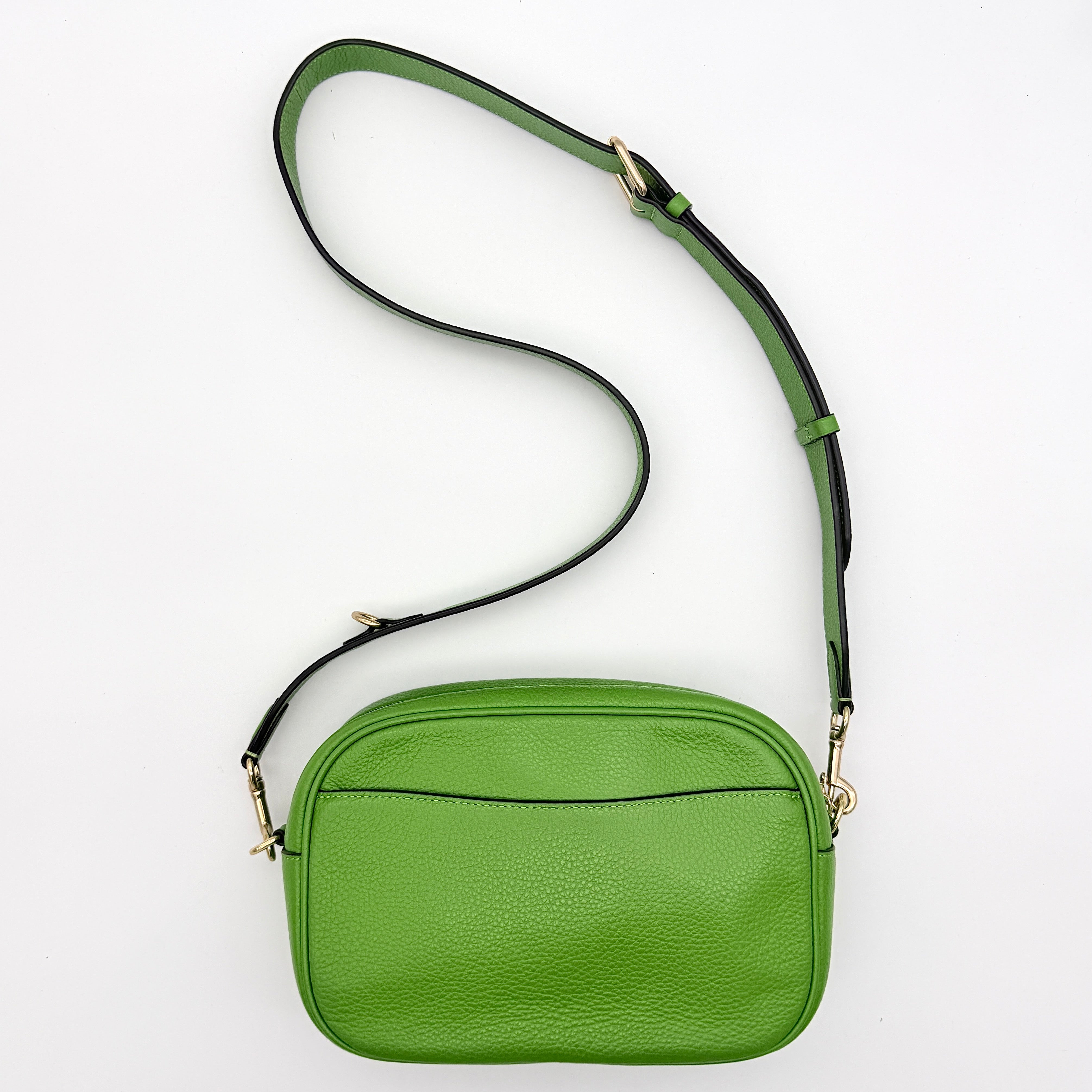 Coach Jamie Camera Crossbody Bag in green textured leather with gold-tone hardware and adjustable strap.