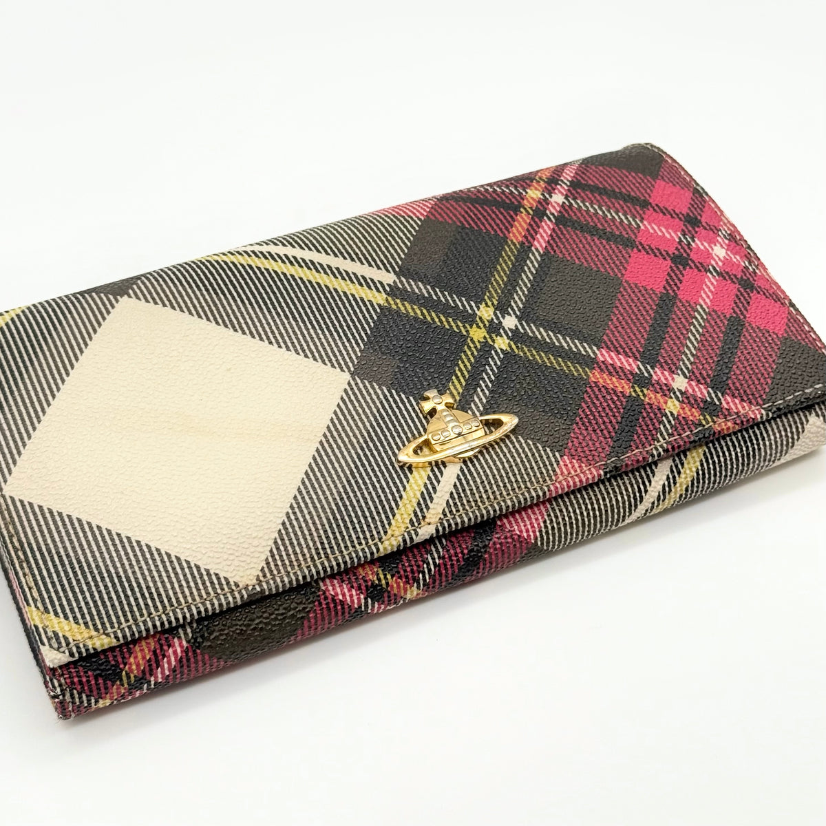Vivienne Westwood multicolour tartan check long wallet with gold orb logo, shown closed against a white background.